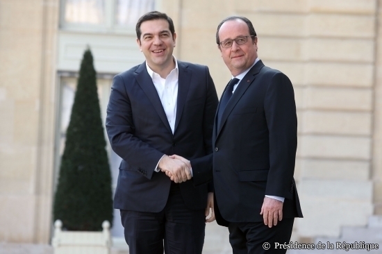 Η φωτογραφία του Αλέξη Τσίπρα με τον Φρανσουά Ολάντ που συνοδεύει το κείμενο του ανακοινωθέντος