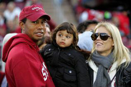 Ο αθλητής με την γυναίκα του και τον γιο του Sam