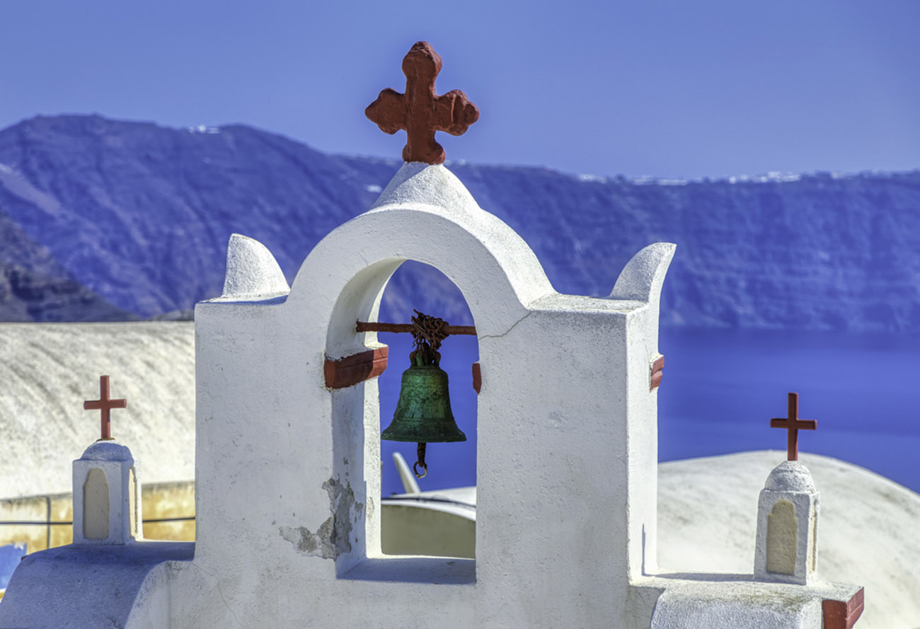 Sunny day in the Oia village on Santorini island, Greece