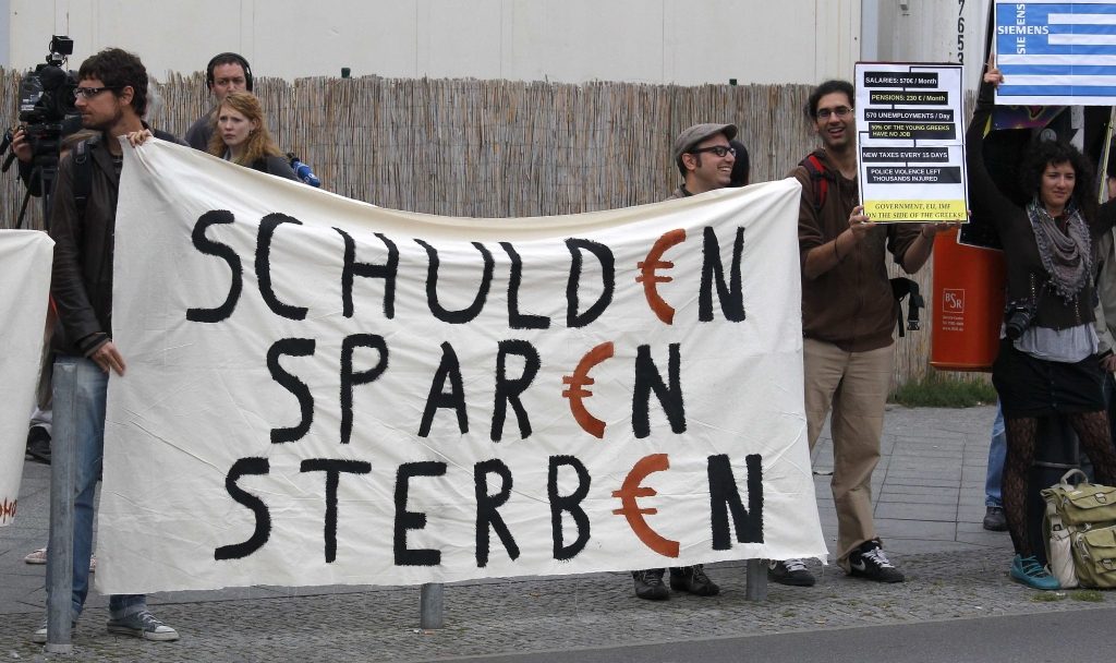 Συγκέντρωση διαμαρτυρίας από έλληνες της Γερμανίας. ΦΩΤΟ REUTERS