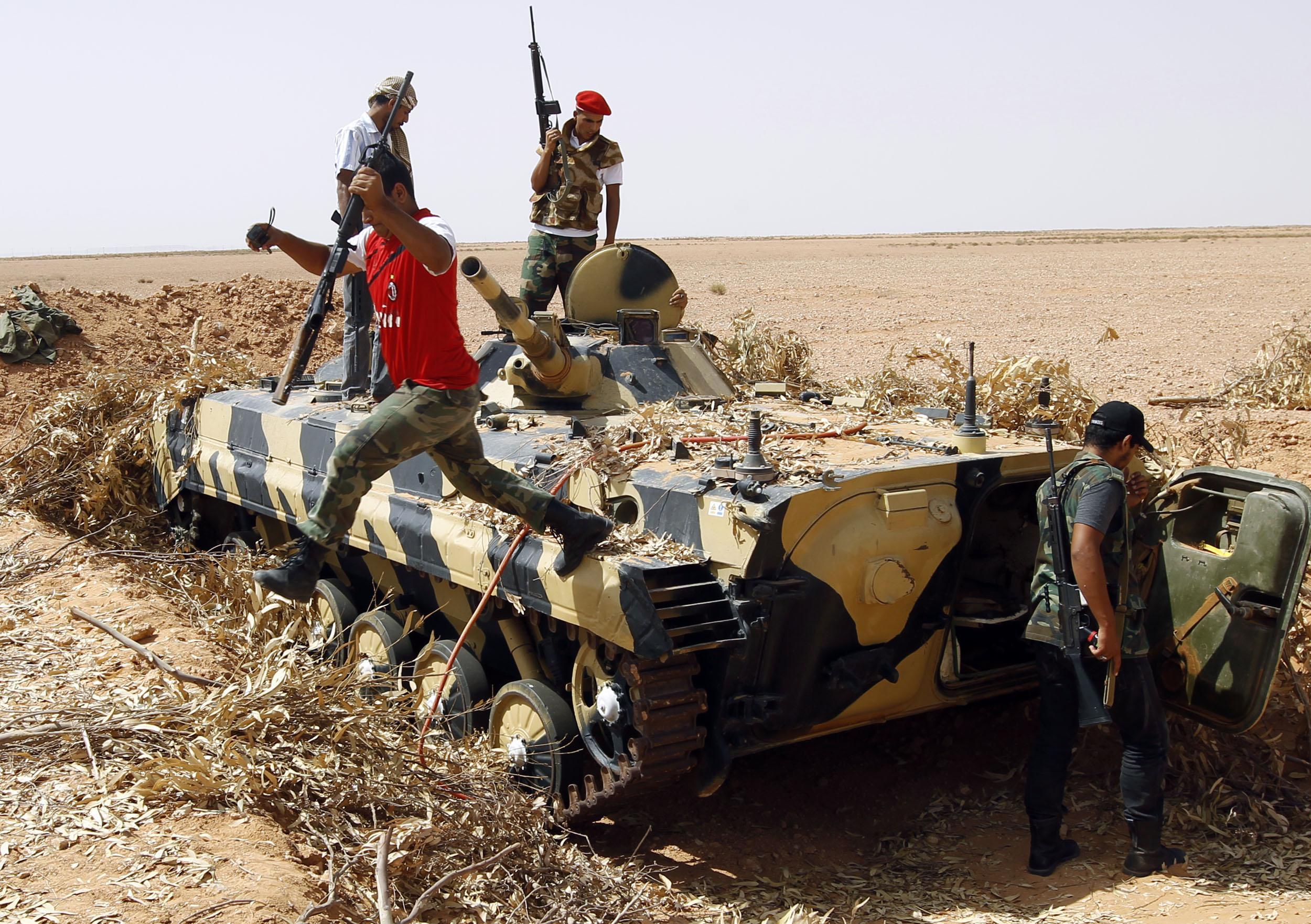 “Πέφτουν” τα τελευταία προπύργια του Καντάφι