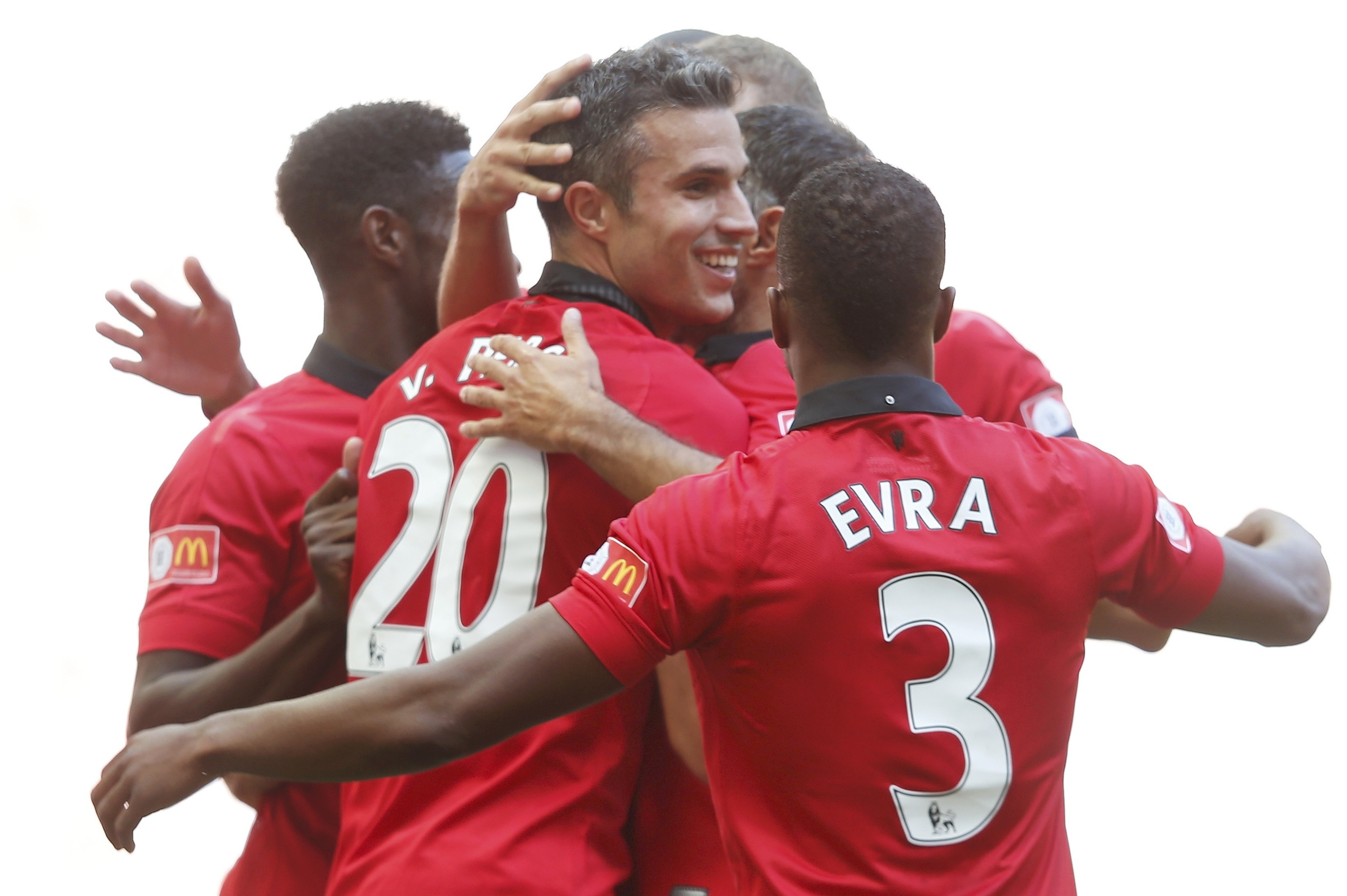 Ο Ρόμπιν Φαν Πέρσι πανηγυρίζει ένα από τα δύο γκολ που σημείωσε κόντρα στην Γουίγκαν ΦΩΤΟ REUTERS.