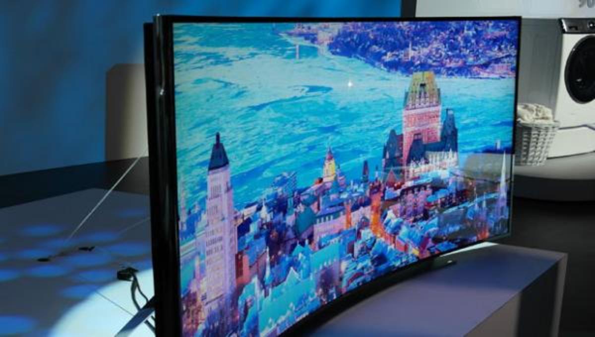 Телевизор самсунг 2014 год. Samsung ue49nu7300. Телевизор самсунг ue49 изогнутый. Самсунг телевизор изогнутый экран 42.