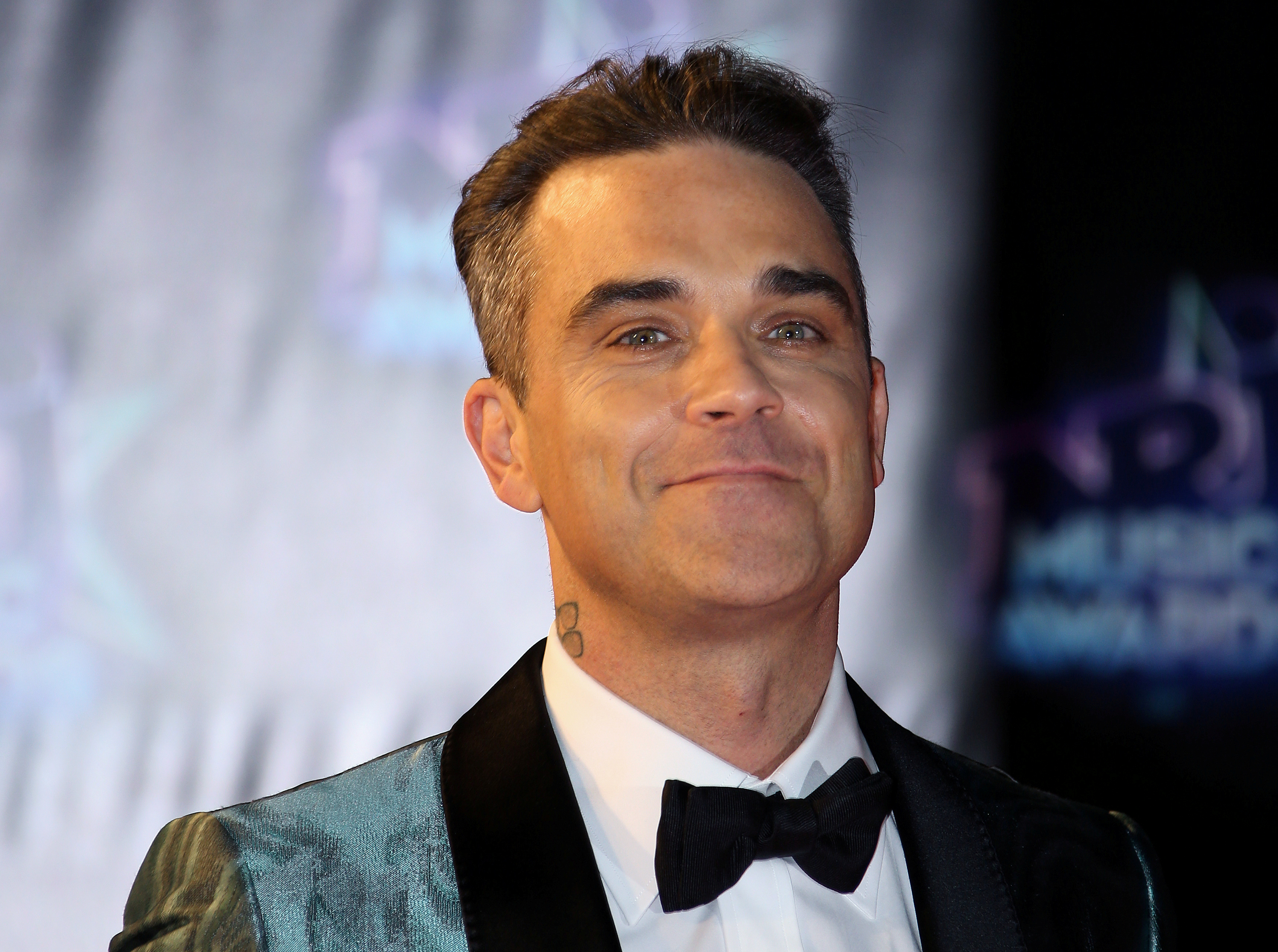 Робби уильямс песни слушать. Робби Уильямс. Robbie Williams певец. Робби Уильямс фото.