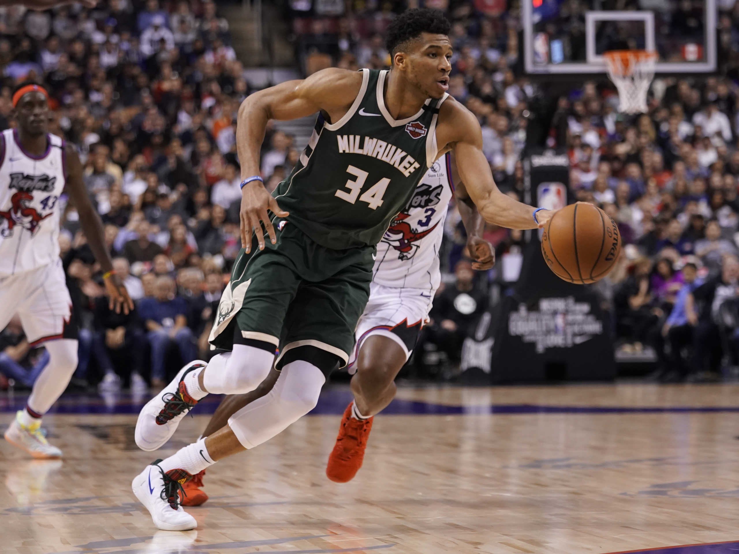 Feb 25, 2020; Toronto, Ontario, CAN; Milwaukee Bucks forward Giannis Antetokounmpo (34) drives tot he net against the Toronto Raptors at Scotiabank Arena. Milwaukee defeated Toronto. Mandatory Credit: John E. Sokolowski-USA TODAY Sports