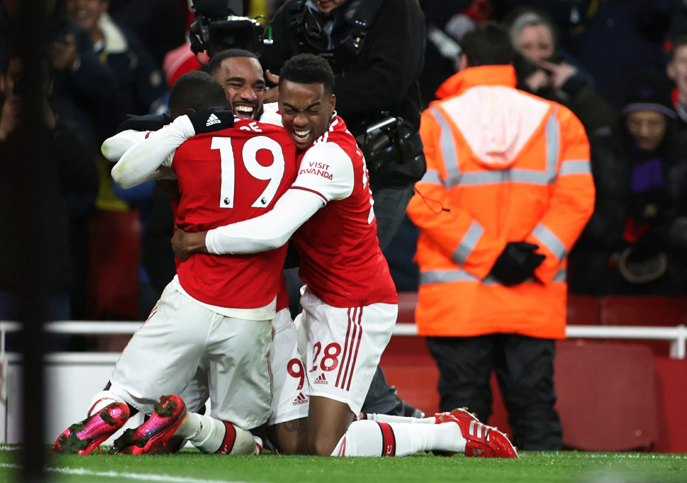 Soccer Football - Premier League - Arsenal v Newcastle United - Emirates Stadium, London, Britain - February 16, 2020   Arsenal's Alexandre Lacazette celebrates scoring their fourth goal with Nicolas Pepe and Joe Willock   REUTERS