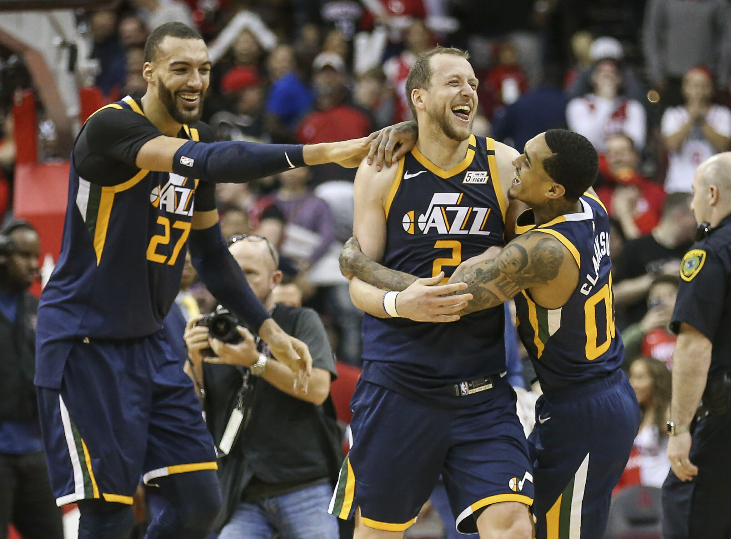 Feb 9, 2020; Houston, Texas, USA; Utah Jazz guard Joe Ingles (2) celebrates with center Rudy Gobert (27) and guard Jordan Clarkson (00) after the Jazz defeated the Houston Rockets at Toyota Center. Mandatory Credit: Troy Taormina-USA TODAY Sports
