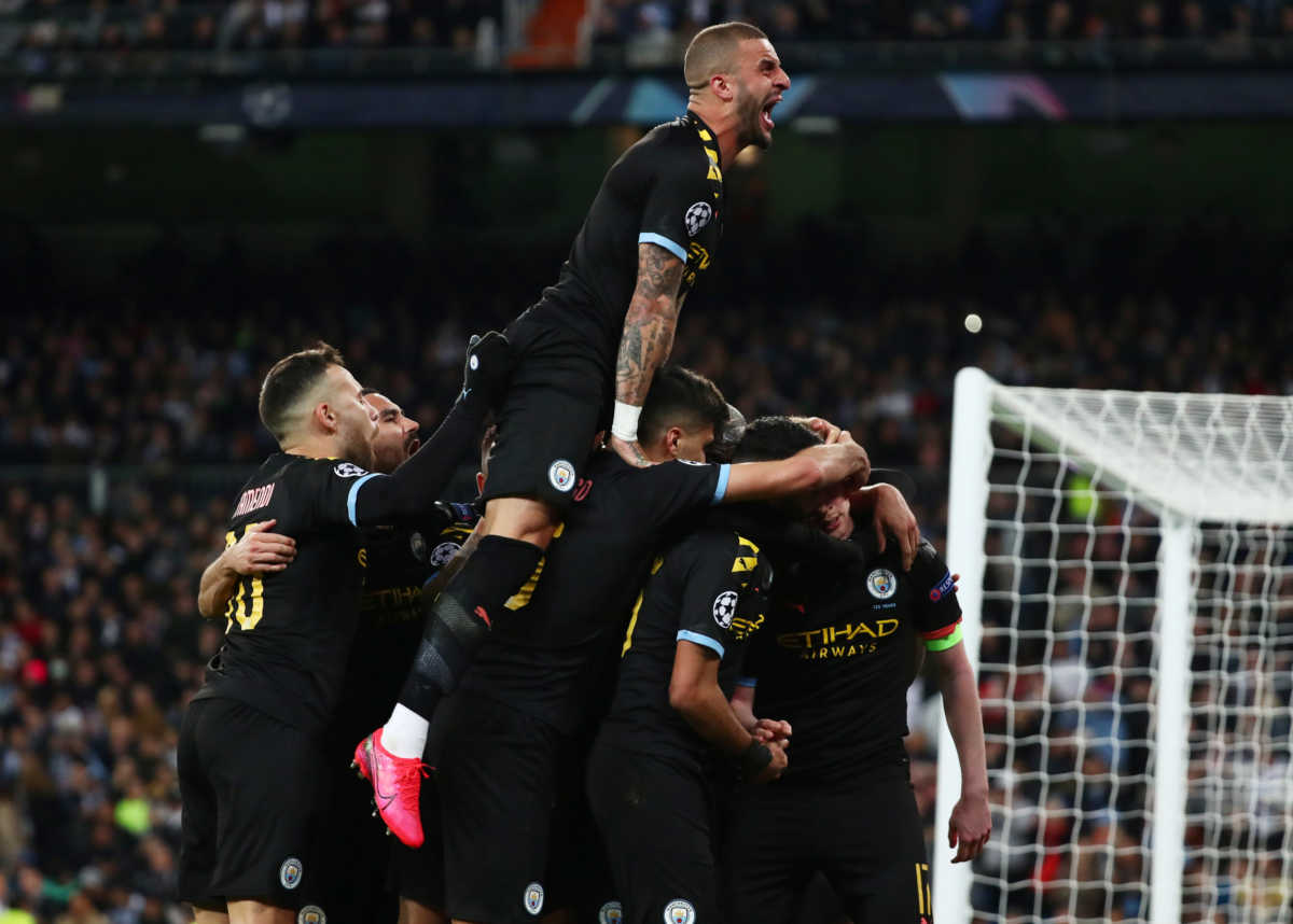 Soccer Football - Champions League - Round of 16 First Leg - Real Madrid v Manchester City - Santiago Bernabeu, Madrid, Spain - February 26, 2020  Manchester City's Kevin De Bruyne celebrates scoring their second goal with Kyle Walker and teammates REUTERS