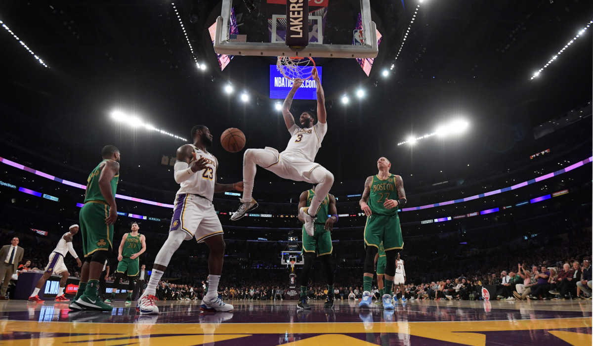 Feb 23, 2020; Los Angeles, California, USA; Los Angeles Lakers forward Anthony Davis (3) dunks the ball as forward LeBron James (23) watches against the Boston Celtics in the second half at Staples Center. The Lakers defeaeted the Celtics 114-112. Mandatory Credit: Kirby Lee-USA TODAY Sports