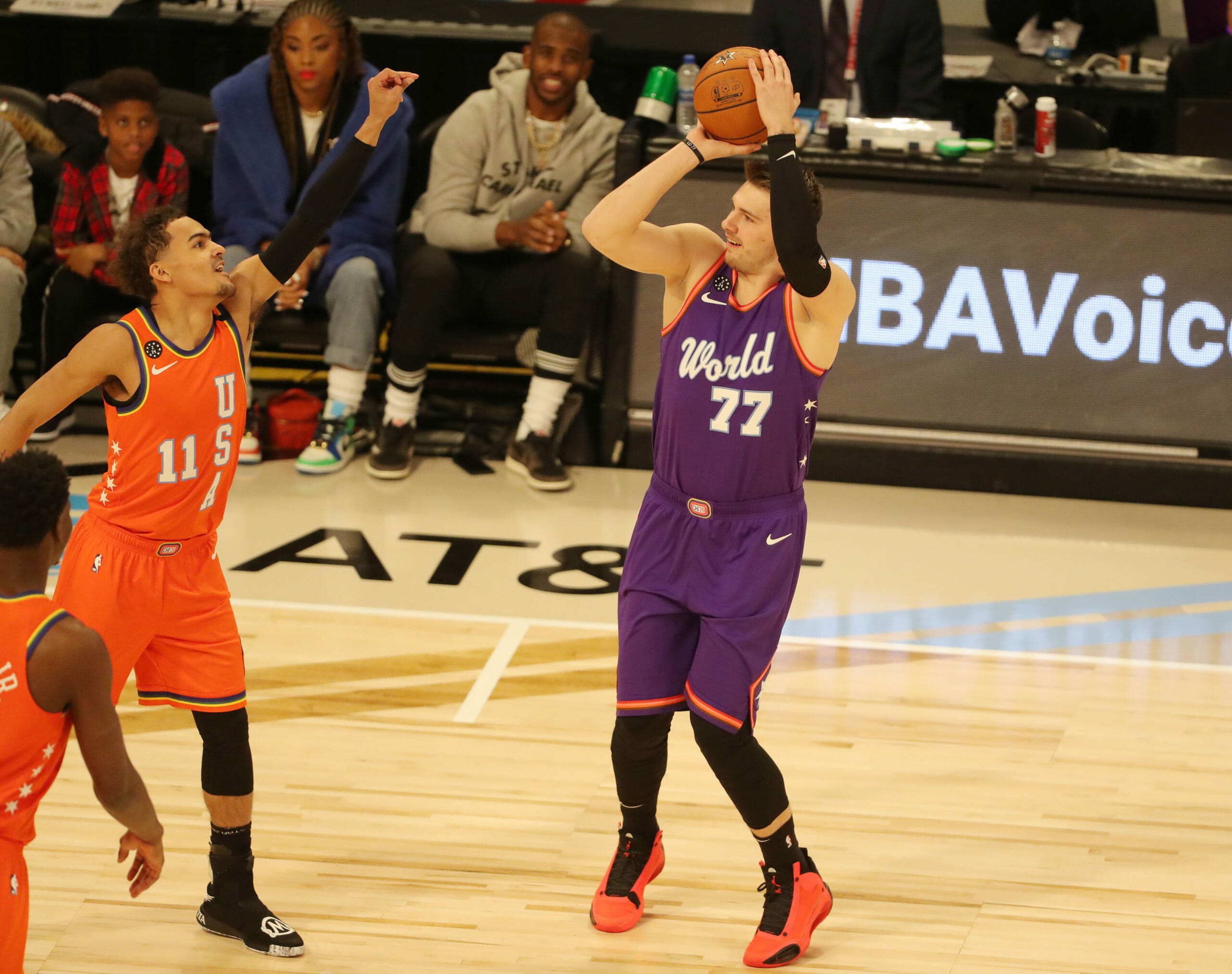 Feb 14, 2020; Chicago, Illinois, USA; World forward Luka Doncic of the Dallas Mavericks shoots over USA guard Trae Young of the Atlanta Hawks during the NBA Rising Stars basketball game at United Center. Mandatory Credit: Dennis Wierzbicki-USA TODAY Sports