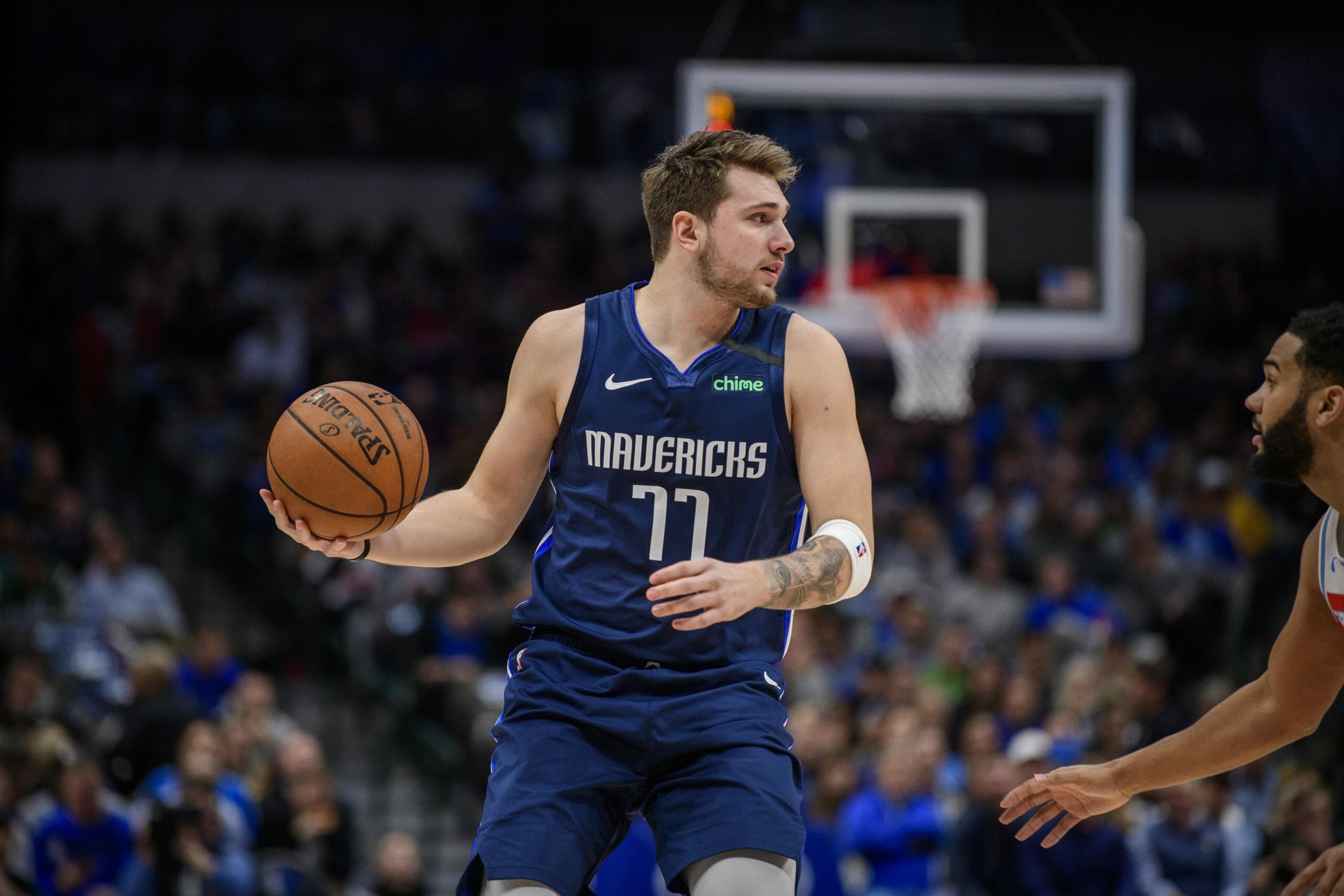 Feb 12, 2020; Dallas, Texas, USA; Dallas Mavericks guard Luka Doncic (77) brings the ball up court against the Sacramento Kings during the first quarter at the American Airlines Center. Mandatory Credit: Jerome Miron-USA TODAY Sports