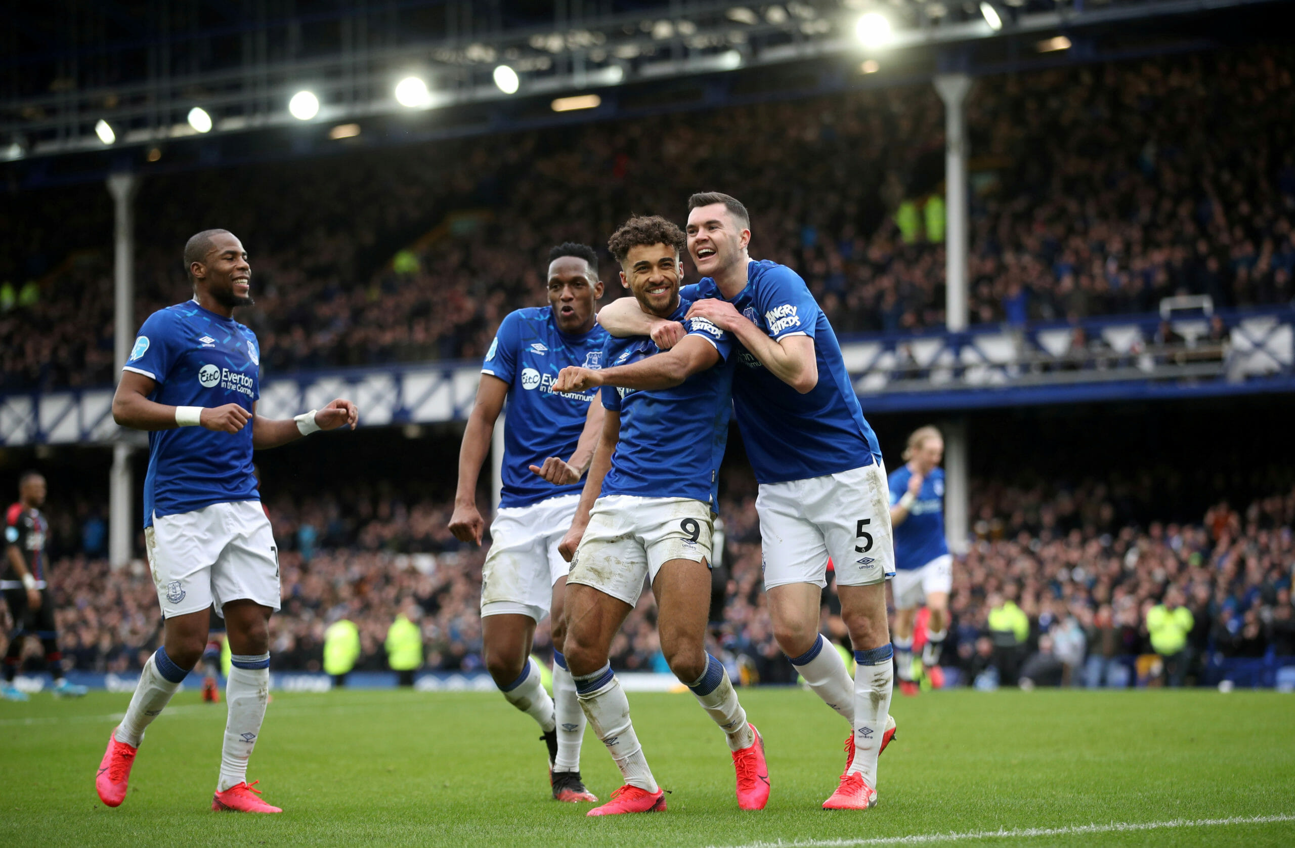 Soccer Football - Premier League - Everton v Crystal Palace - Goodison Park, Liverpool, Britain - February 8, 2020  Everton's Dominic Calvert-Lewin celebrates scoring their third goal with Djibril Sidibe, Michael Keane and Yerry Mina   Action Images via Reuters