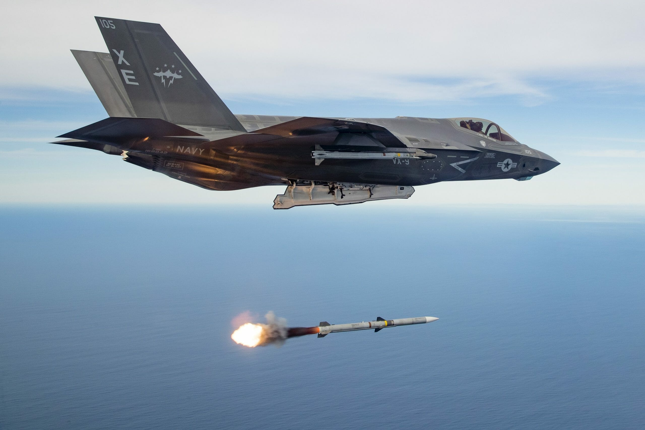 EDWARDS AIR FORCE BASE, Calif. (Jan. 24, 2019) U.S. Navy Lt. Daniel "Crib" Armenteros, piloting an F-35C Lightning II assigned to Naval Air Station China Lake's Air Test and Evaluation Squadron Nine (VX-9), conducts the first live-fire test of an AIM-120 missile released from an operational Joint Strike Fighter. The advanced medium-range air-to-air Missile was released from the aircraft's internal weapons storage bay over a controlled sea test range in the Pacific Ocean as part of efforts by the 412th Test Wing and Joint Operational Test Team at Edwards Air Force Base. (U.S. Air Force photo by Christopher Okula