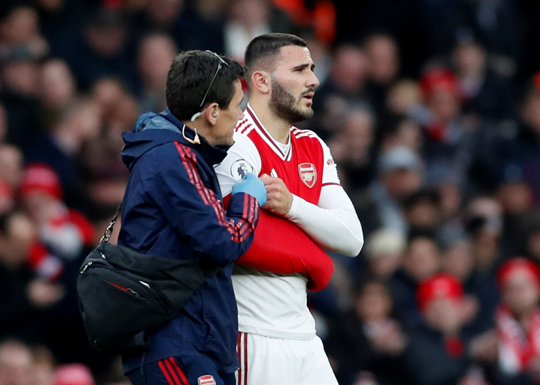 Soccer Football - Premier League - Arsenal v Everton - Emirates Stadium, London, Britain - February 23, 2020  Arsenal's Sead Kolasinac is substituted off after sustaining an injury  REUTERS