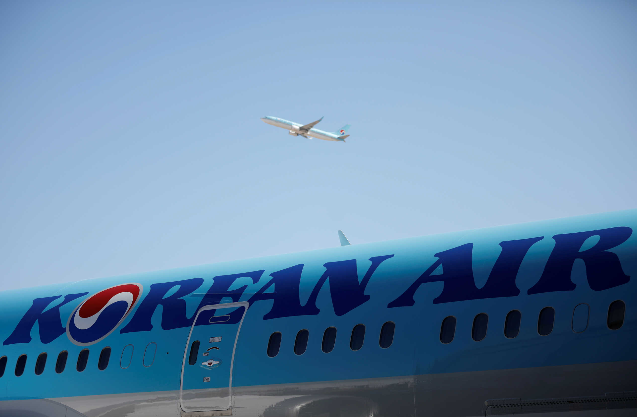 FILE PHOTO - The logo of Korean Air Lines is seen on a plane at its aviation shed in Incheon, South Korea, February 27, 2017.  REUTERS