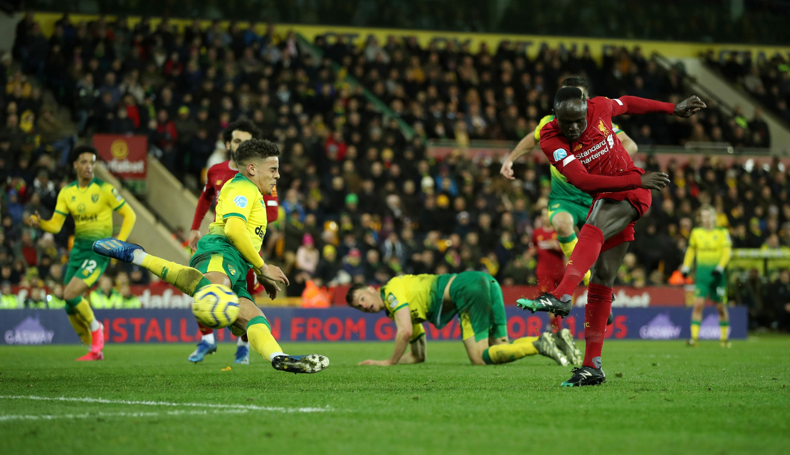 Soccer Football - Premier League - Norwich City v Liverpool - Carrow Road, Norwich, Britain - February 15, 2020  Liverpool's Sadio Mane scores their first goal   REUTERS
