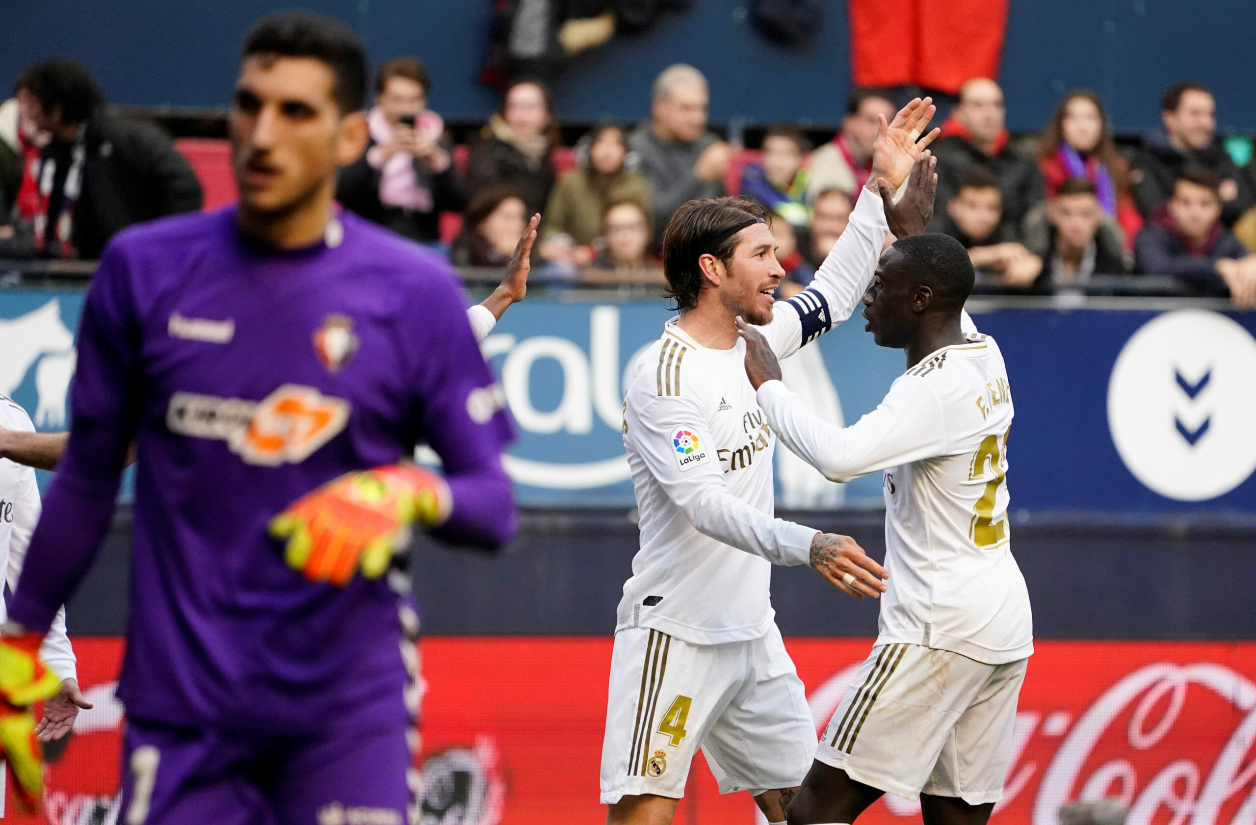 Soccer Football - La Liga Santander - Osasuna v Real Madrid - El Sadar Stadium, Pamplona, Spain - February 9, 2020   Real Madrid's Sergio Ramos and Ferland Mendy celebrate their third goal    REUTERS