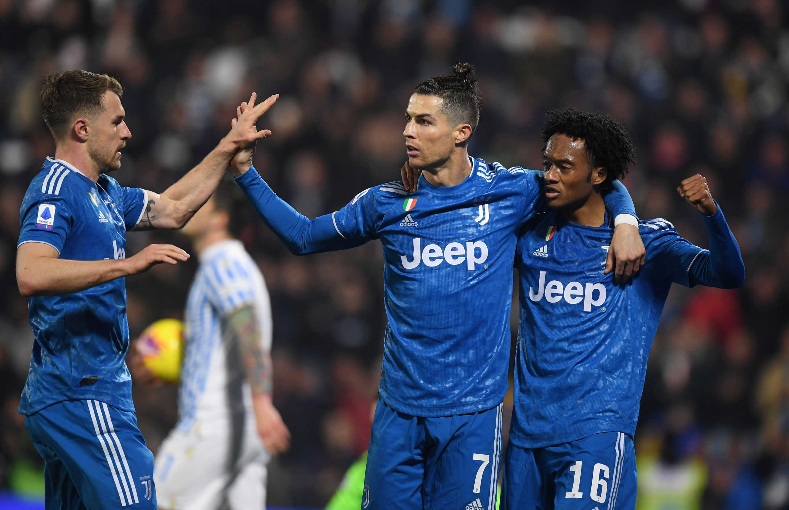 Soccer Football - Serie A - SPAL v Juventus - Paolo Mazza, Ferrara, Italy - February 22, 2020  Juventus' Cristiano Ronaldo celebrates scoring their first goal with Juan Cuadrado   REUTERS
