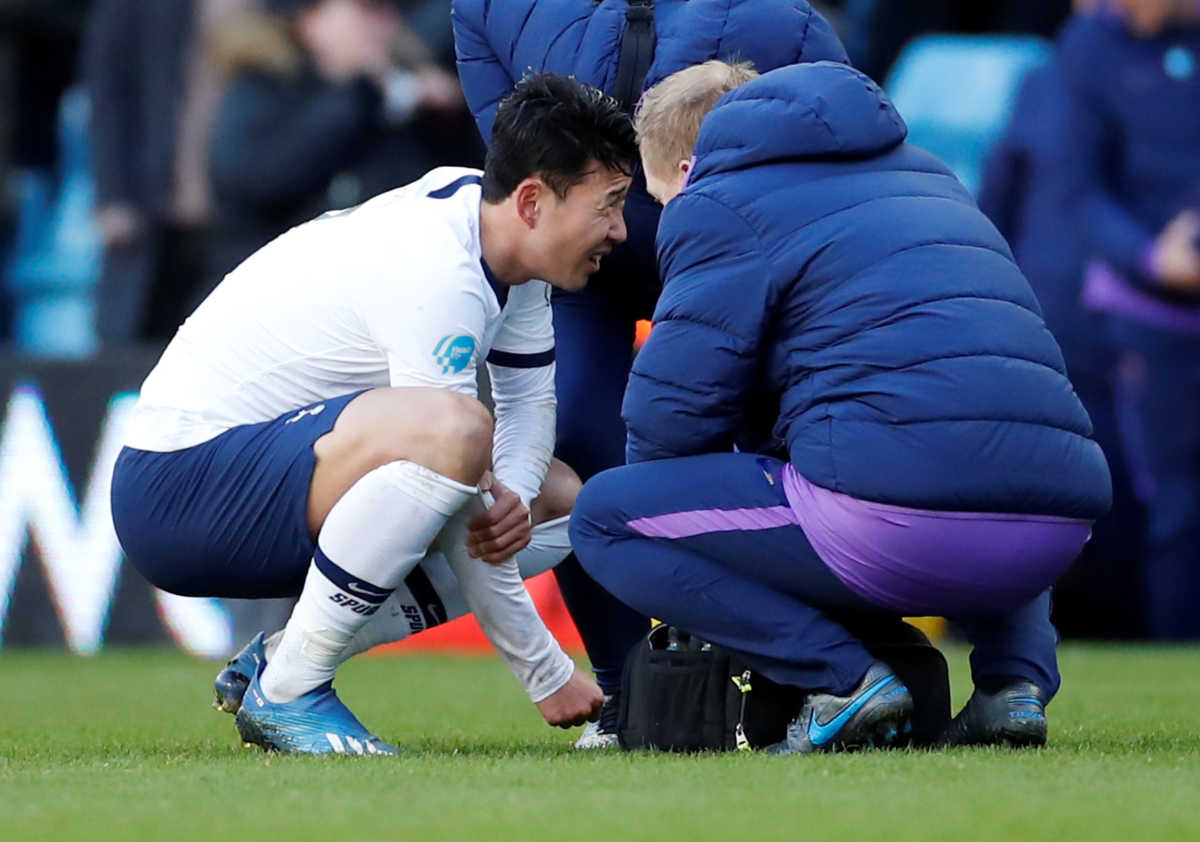 Soccer Football - Premier League - Aston Villa v Tottenham Hotspur - Villa Park, Birmingham, Britain - Picture taken February 16, 2020    Tottenham Hotspur's Son Heung-min holds his arm during the match   Action Images via Reuters