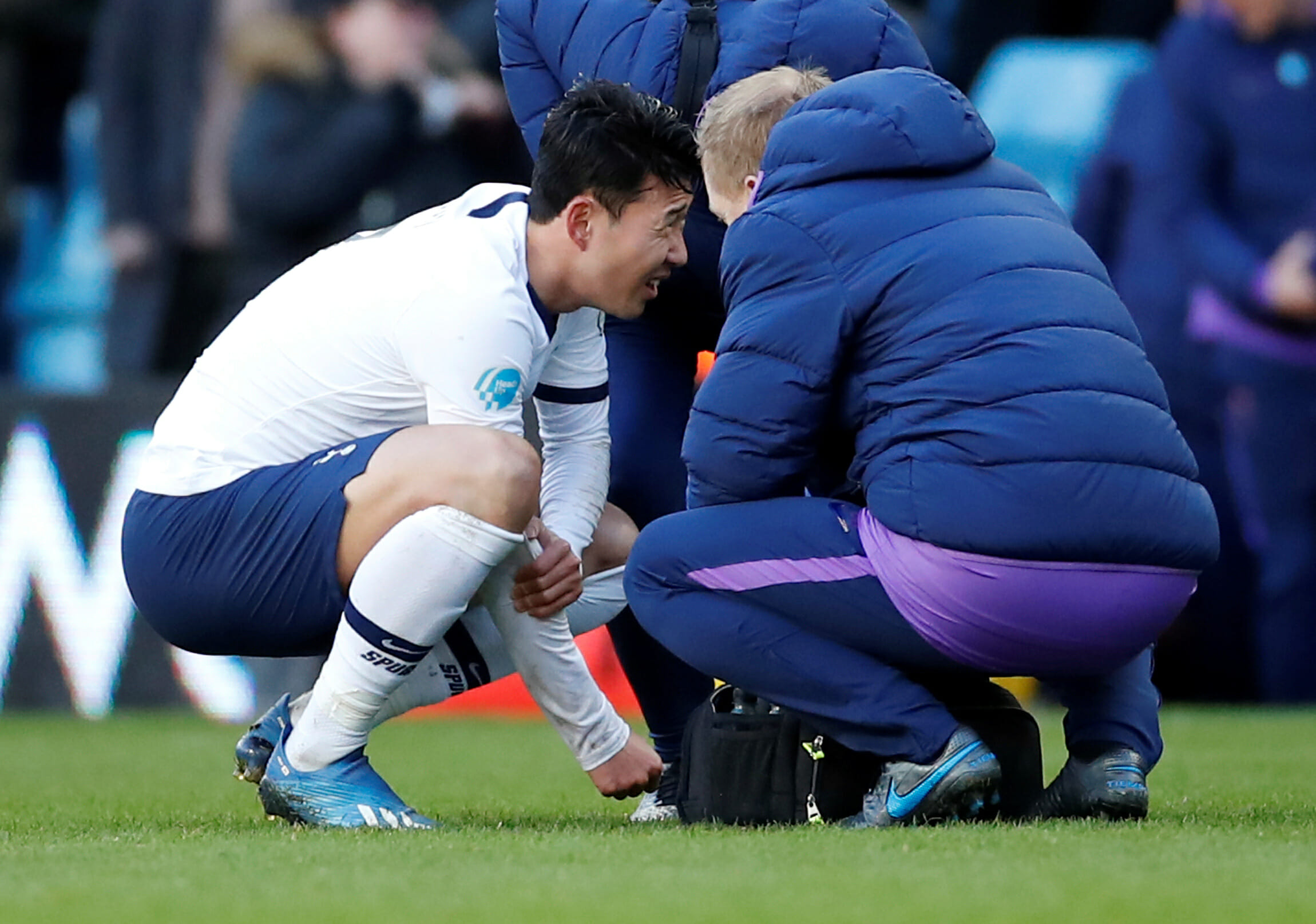 Soccer Football - Premier League - Aston Villa v Tottenham Hotspur - Villa Park, Birmingham, Britain - Picture taken February 16, 2020    Tottenham Hotspur's Son Heung-min holds his arm during the match   Action Images via Reuters