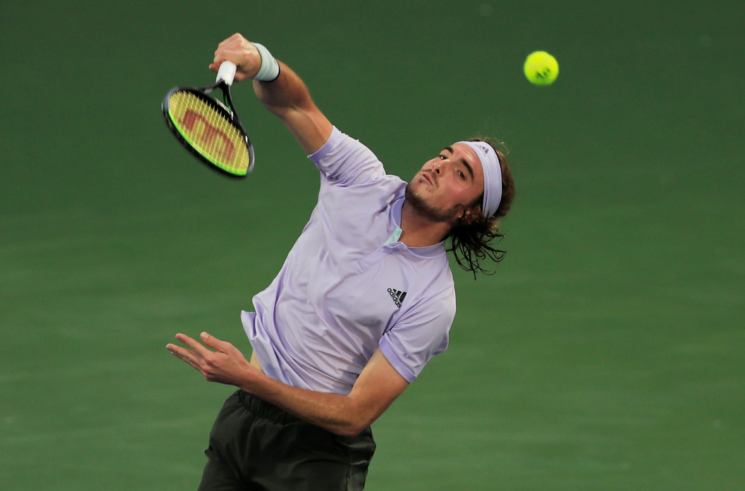 Tennis - ATP 500 - Dubai Tennis Championships - Dubai Duty Free Tennis Stadium, Dubai, United Arab Emirates - February 28, 2020   Greece's Stefanos Tsitsipas in action during his Semi Final match against Britain's Dan Evans   REUTERS