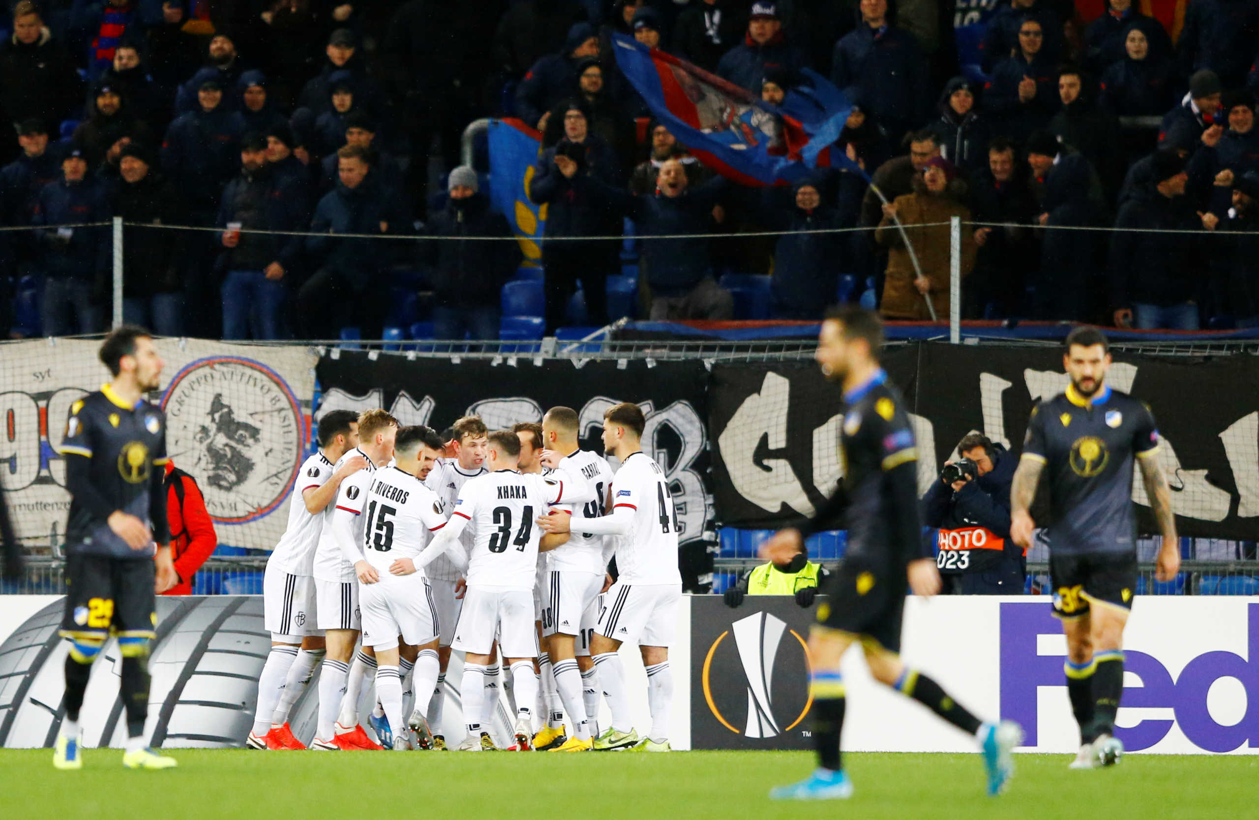 Soccer Football - Europa League - Round of 32 Second Leg - Basel v Apoel Nicosia - St. Jakob-Park, Basel, Belgium - February 27, 2020  Basel's Fabian Frei celebrates scoring their first goal with teammates   REUTERS