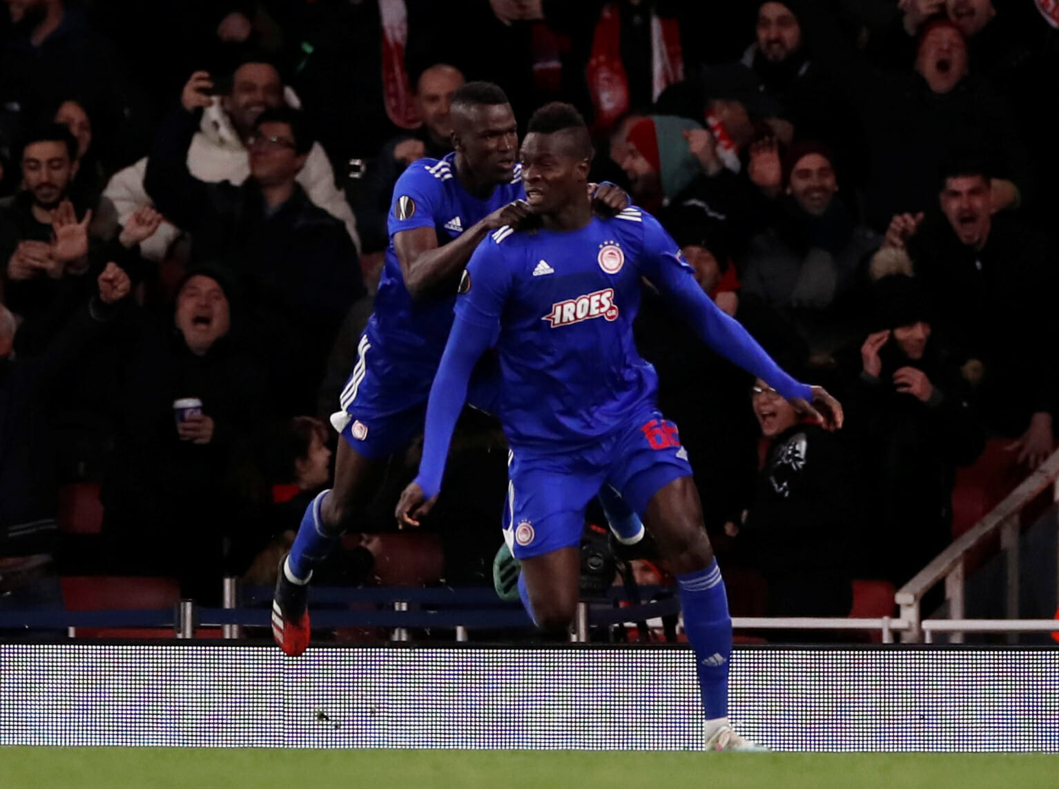 Soccer Football - Europa League - Round of 32 Second Leg - Arsenal v Olympiacos - Emirates Stadium, London, Britain - February 27, 2020  Olympiacos' Pape Abou Cisse celebrates scoring their first goal with Mohamed Camara   Action Images via Reuters