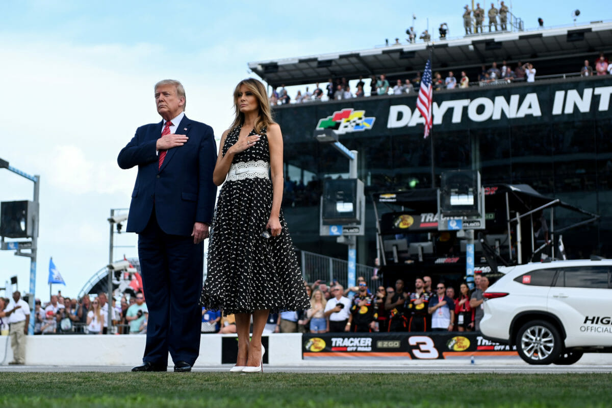 U.S. President Donald Trump and first lady Melania Trump listen to the Star Spangled Banner at the NASCAR Daytona 500 in Daytona Beach, Florida, U.S., February 16, 2020. REUTERS