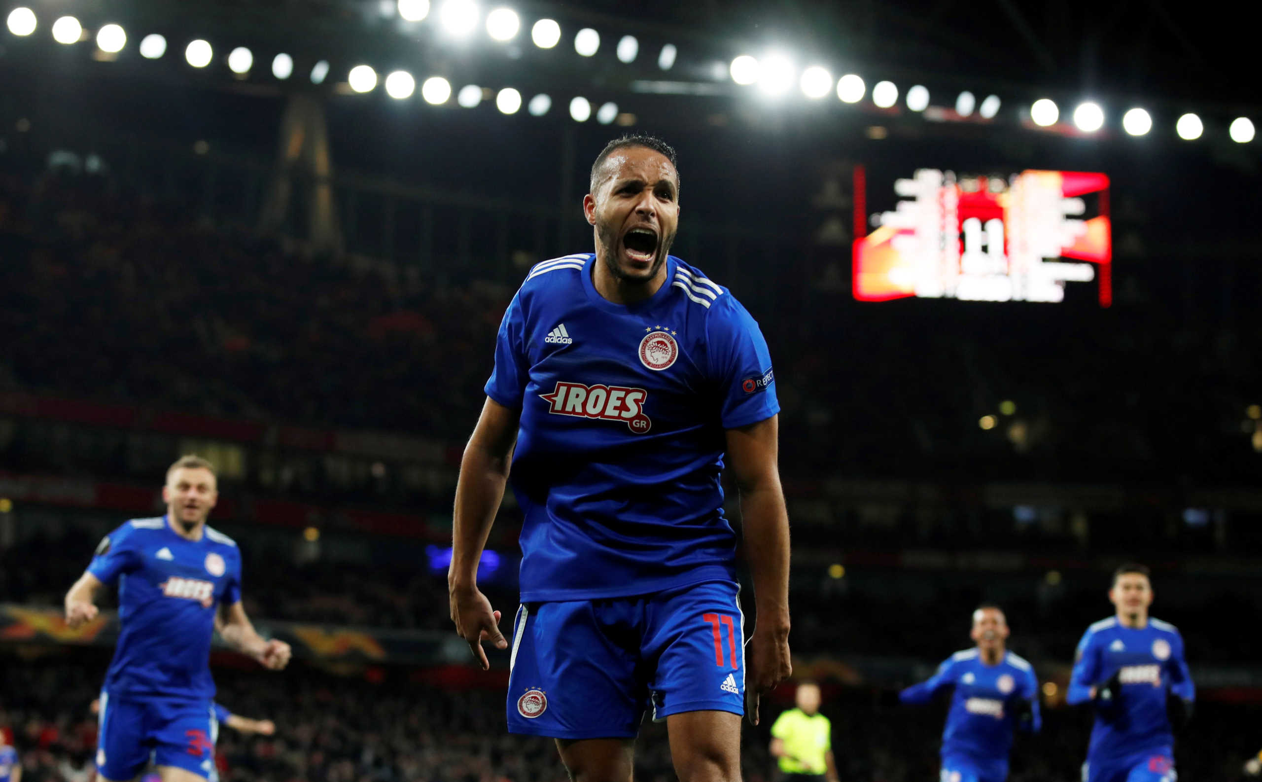 Soccer Football - Europa League - Round of 32 Second Leg - Arsenal v Olympiacos - Emirates Stadium, London, Britain - February 27, 2020  Olympiacos' Youssef El-Arabi celebrates scoring their second goal   REUTERS