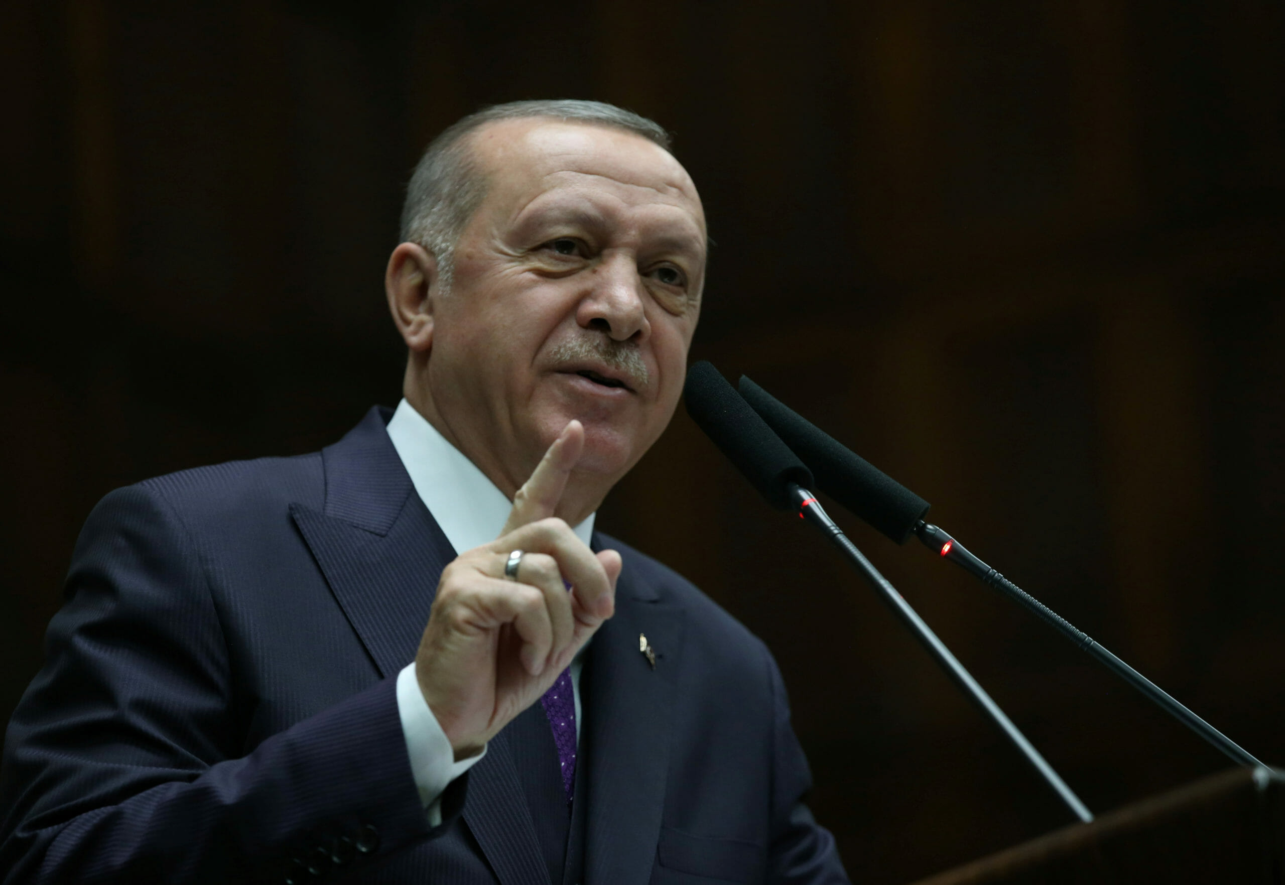 Turkish President Tayyip Erdogan addresses members of his ruling AK Party during a meeting at the Parliament in Ankara, Turkey, February 5, 2020. Presidential Press Office