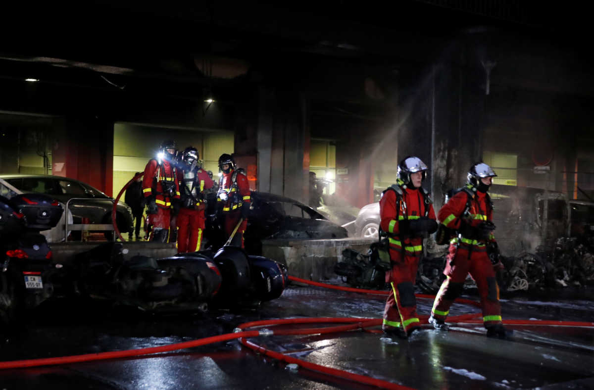 Fire fighters work at the scene of a fire near Gare de Lyon railway station in Paris, France, February 28, 2020. REUTERS