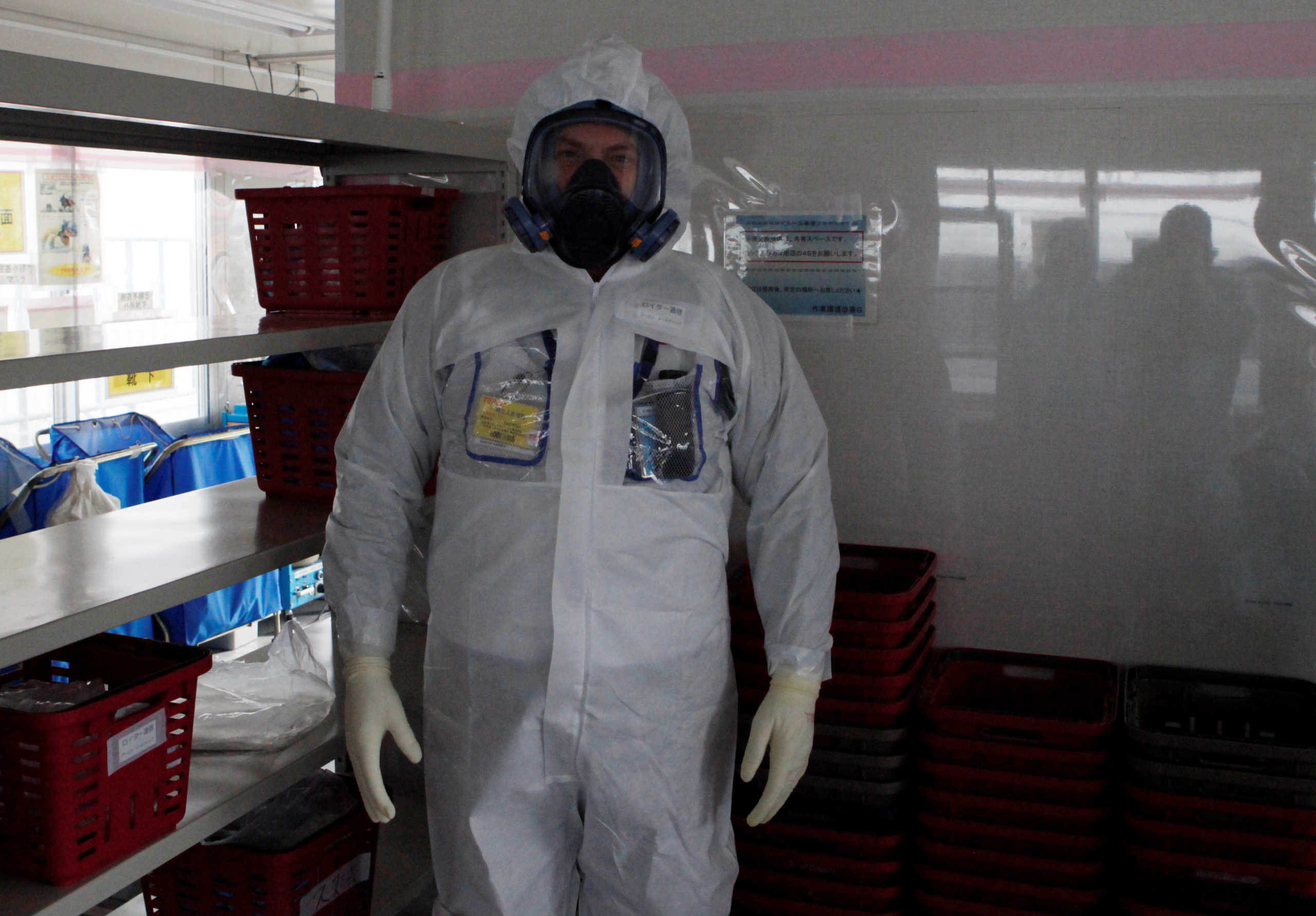 Reuters journalist Aaron Sheldrick wearing a protective suit, visits the Tokyo Electric Power Co's (TEPCO) tsunami-crippled Fukushima Daiichi nuclear power plant in Okuma town, Fukushima prefecture, Japanm January 15, 2020. Picture taken January 15, 2020.  TEPCO