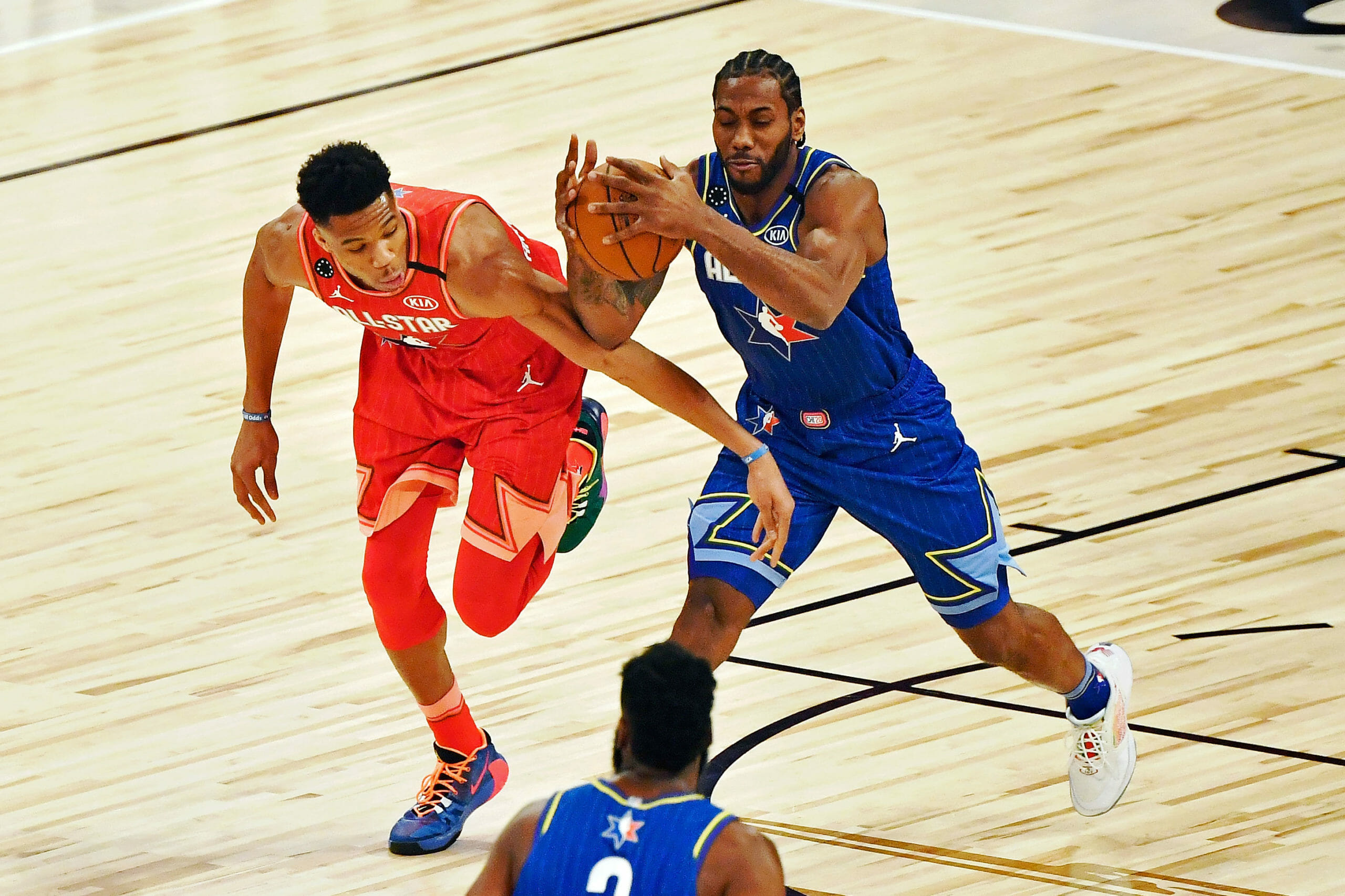 Feb 16, 2020; Chicago, Illinois, USA; Team LeBron forward Kawhi Leonard of the LA Clippers grabs the ball while under pressure from Team Giannis forward Giannis Antetokounmpo of the Milwaukee Bucks during the first quarter during the 2020 NBA All Star Game at United Center. Mandatory Credit: Quinn Harris-USA TODAY Sports