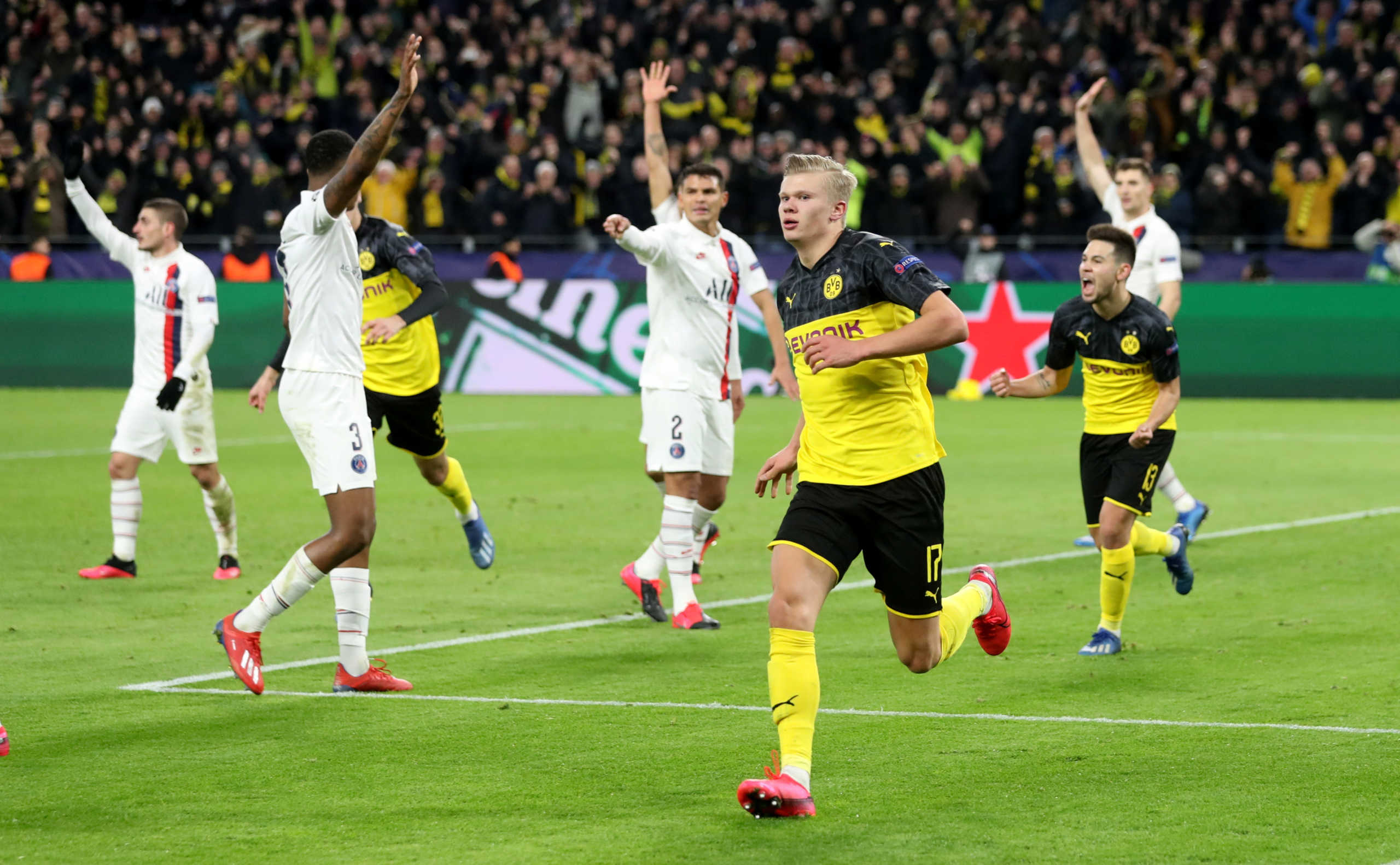 Soccer Football - Champions League - Round of 16 First Leg - Borussia Dortmund v Paris St Germain - Signal Iduna Park, Dortmund, Germany - February 18, 2020  Borussia Dortmund's Erling Braut Haaland celebrates scoring their first goal               REUTERS