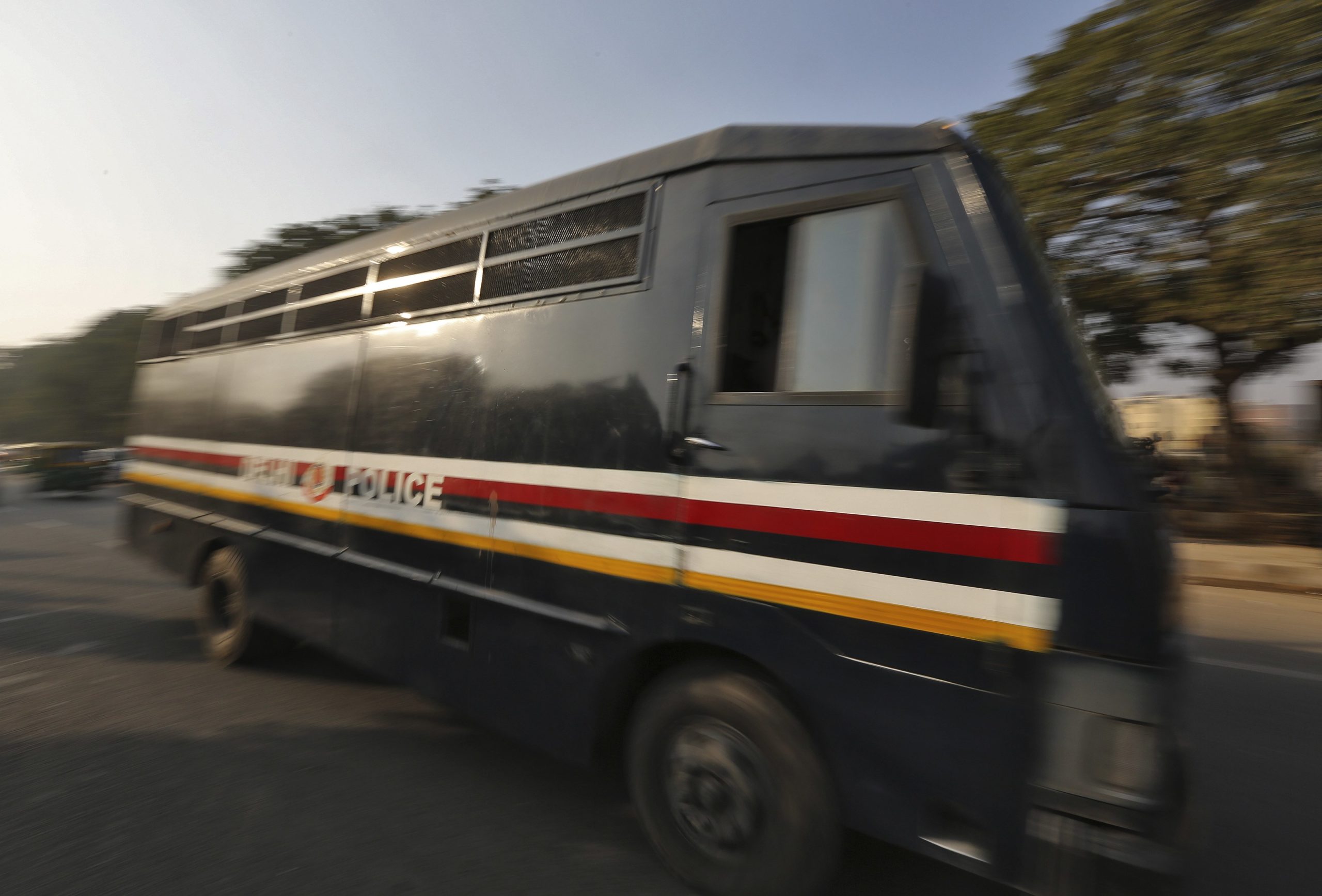 A police van carrying five men accused of the gang rape and murder of an Indian student leaves a court in New Delhi January 7, 2013. Five men accused of the gang rape and murder of an Indian student appeared in court on Monday to hear charges against them, after two of them offered evidence possibly in return for a lighter sentence in the case that has led to a global outcry. The five men, along with a teenager, are accused of raping the 23-year-old physiotherapy student on a bus in New Delhi. She died two weeks later on December 28 in a Singapore hospital. REUTERS