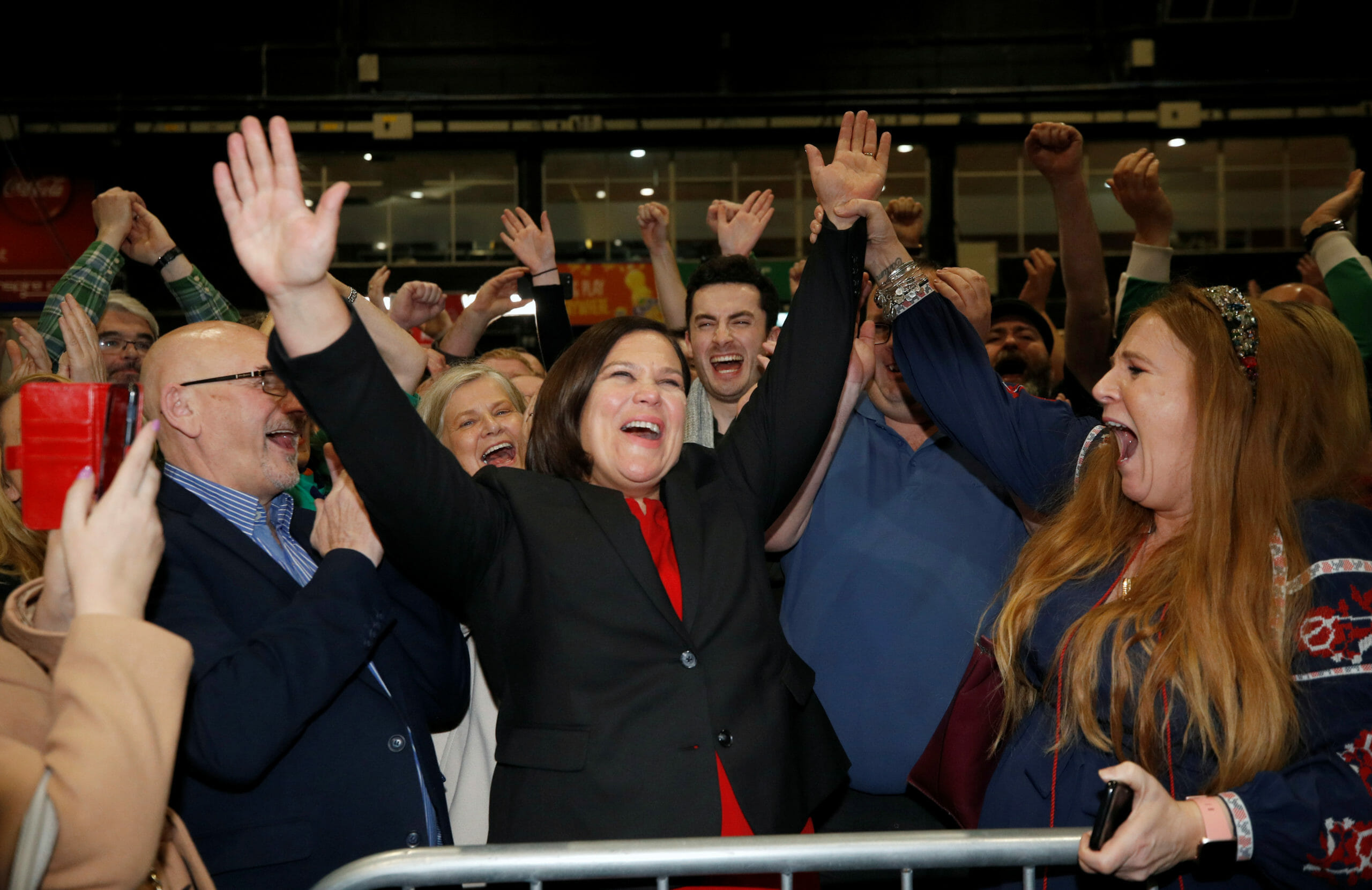 Sinn Fein leader Mary Lou McDonald celebrates with supporters after the announcement of voting results in a count centre, during Ireland's national election, in Dublin, Ireland, February 9, 2020. REUTERS