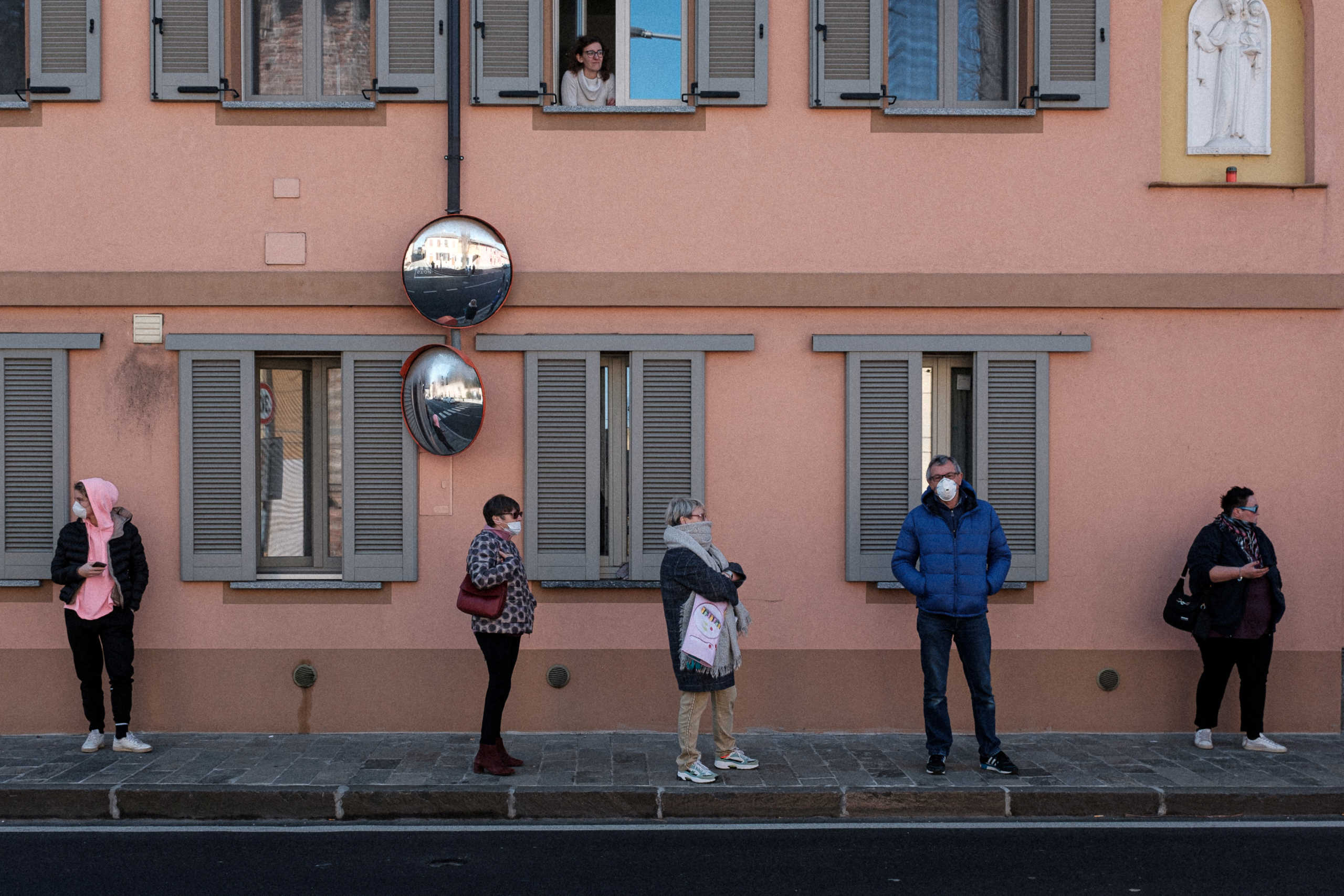 Life inside a red zone: Residents of San Fiorano, one of the towns on lockdown due to a coronavirus outbreak, wear protective masks in this picture taken by schoolteacher Marzio Toniolo in San Fiorano, Italy, February 24, 2020. Picture taken February 24, 2020. Marzio Toniolo