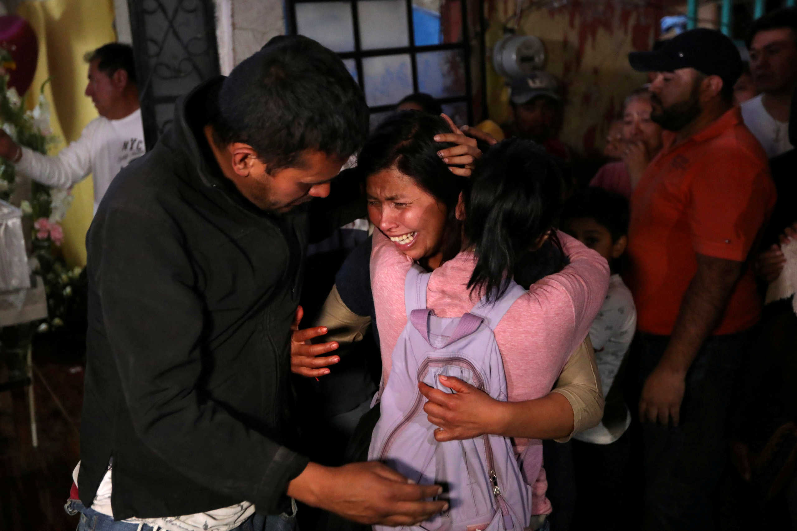 Maria Magdalena, mother of Fatima Cecilia Aldrighett, 7, who went missing on February 11 and whose body was discovered over the weekend inside a plastic garbage bag, reacts as Fatima's coffin arrives at their house in Mexico City, Mexico, February 17, 2020. REUTERS