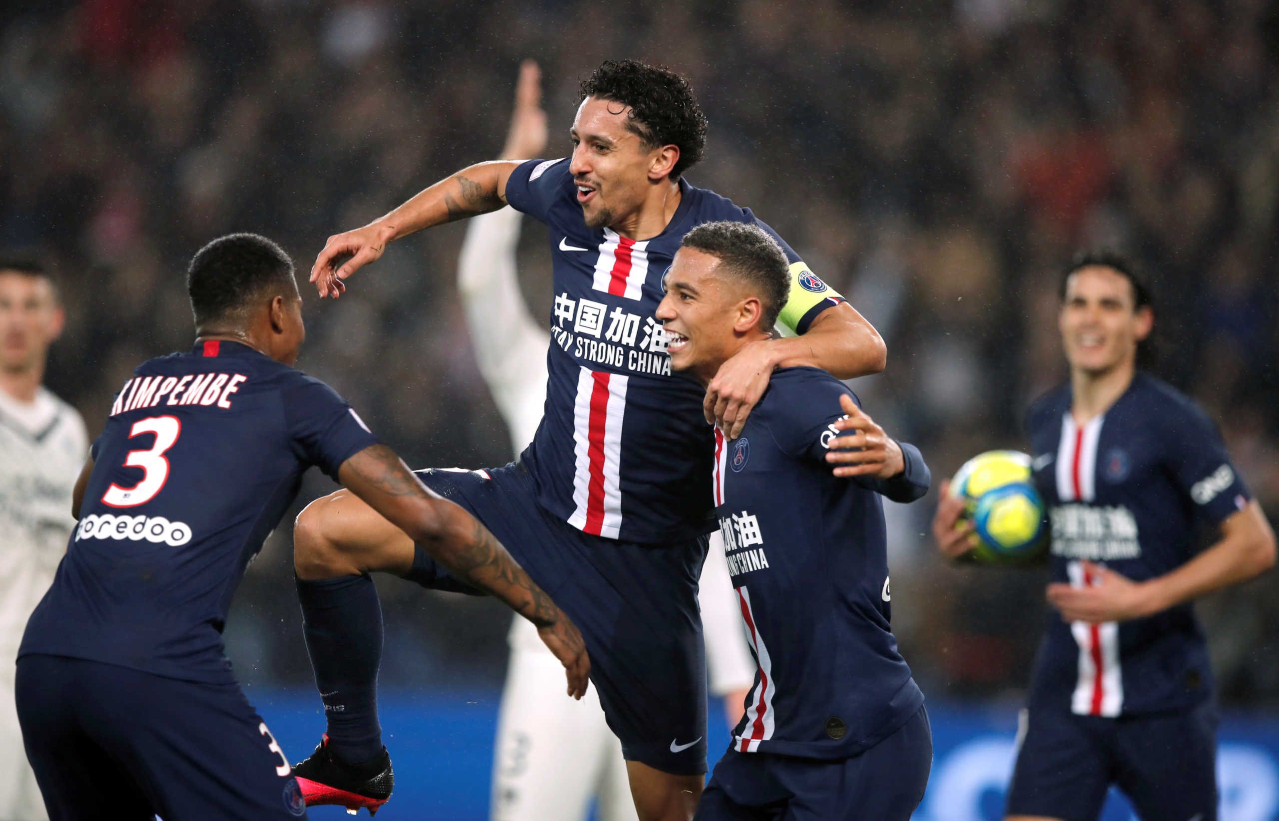 Soccer Football - Ligue 1 - Paris St Germain v Bordeaux - Parc des Princes, Paris, France - February 23, 2020   Paris St Germain's Marquinhos celebrates scoring their second goal with Thilo Kehrer and Presnel Kimpembe    REUTERS