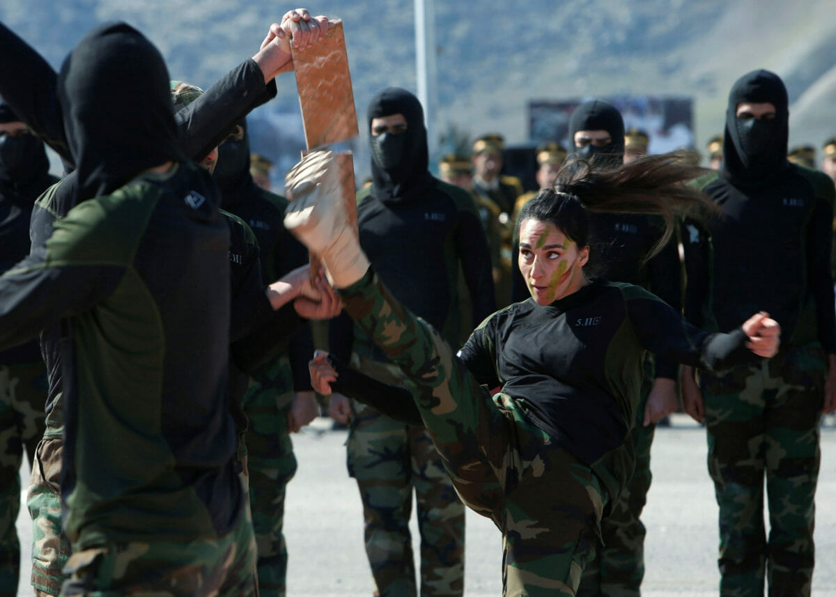 Members of Kurdish Peshmerga Special Forces demonstrate their skills during their graduation ceremony at a military camp in Soran district, in Erbil province, Iraq February 12, 2020. REUTERS