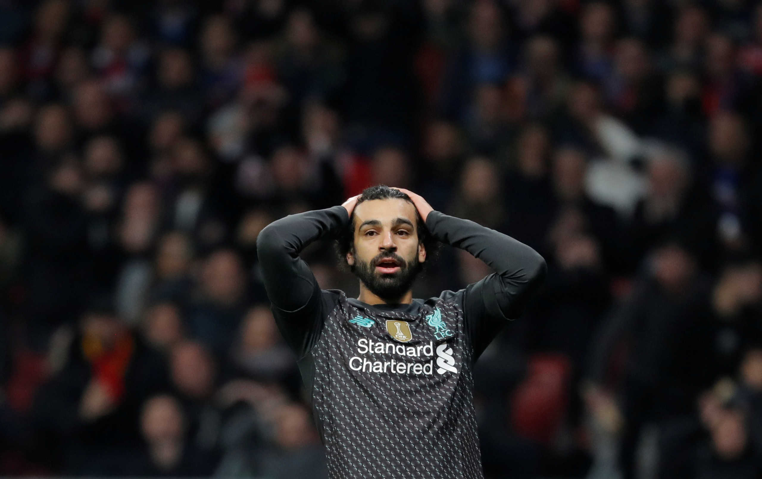 Soccer Football - Champions League - Round of 16 First Leg - Atletico Madrid v Liverpool - Wanda Metropolitano, Madrid, Spain - February 18, 2020  Liverpool's Mohamed Salah reacts after a missed chance  REUTERS