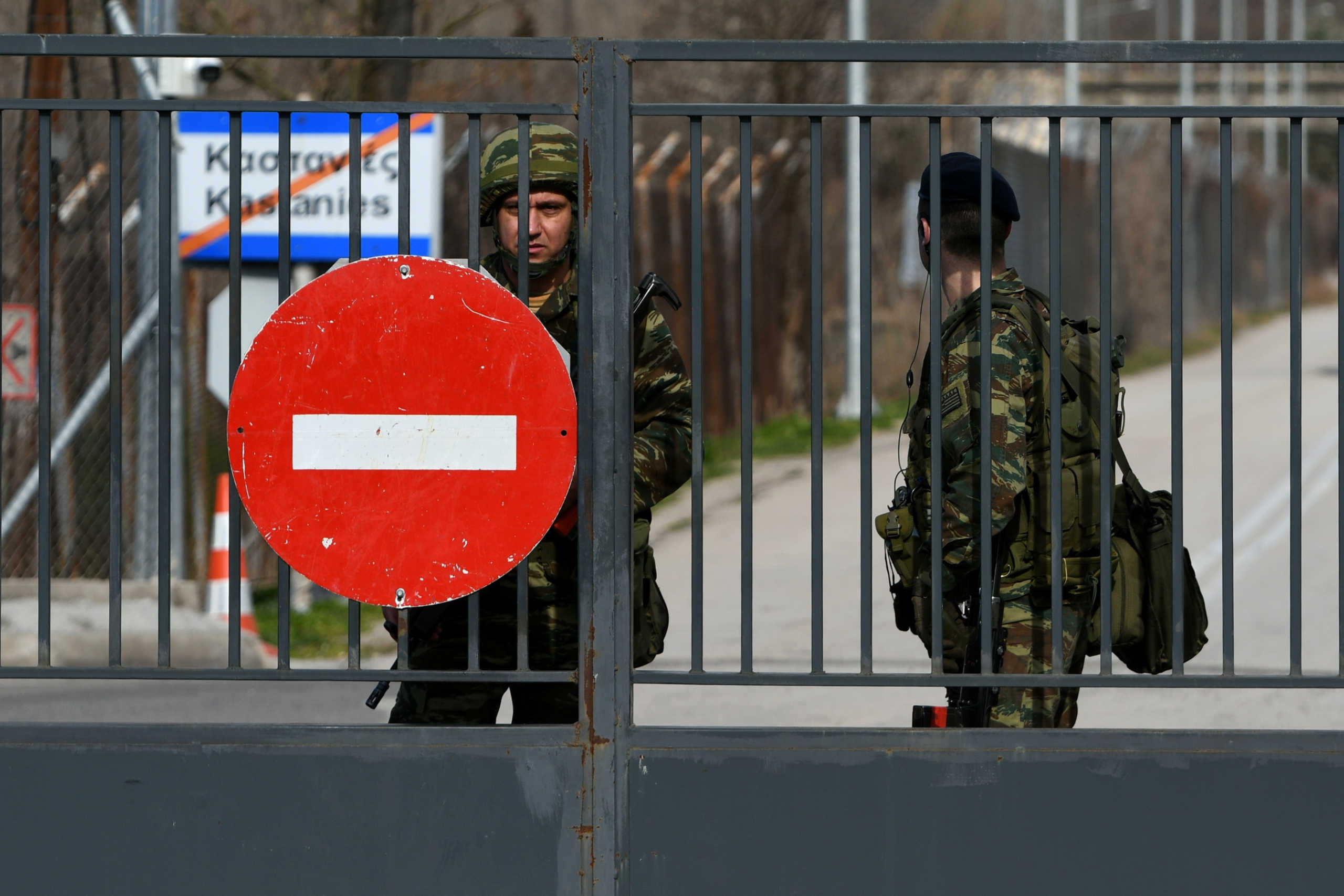 Greek soldiers stand guard at the closed Kastanies border crossing with Turkey's Pazarkule, in the region of Evros, Greece, February 28, 2020. REUTERS