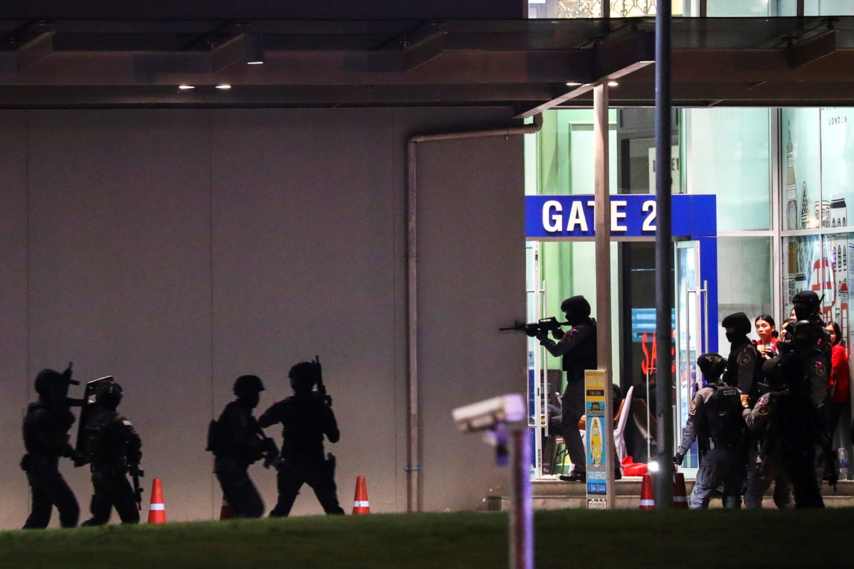 Thailand security forces enter in a shopping mall as they chase a shooter hidden in after a mass shooting in front of the Terminal 21, in Nakhon Ratchasima, Thailand February 9, 2020. REUTERS