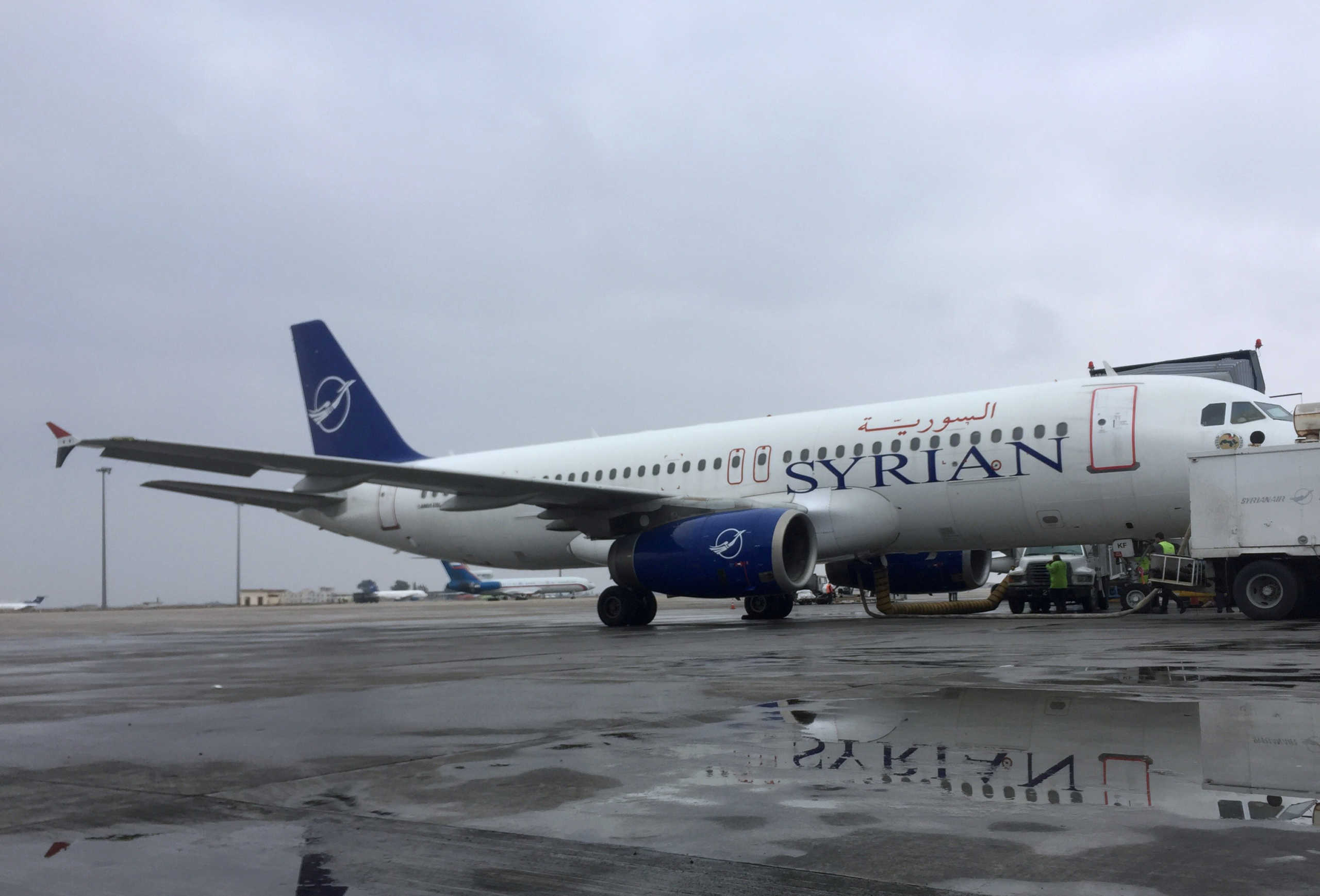 A SyrianAir Airbus A320-200, waits to take off to Aleppo, on the tarmac of Damascus international airport, Syria February 19, 2020. REUTERS