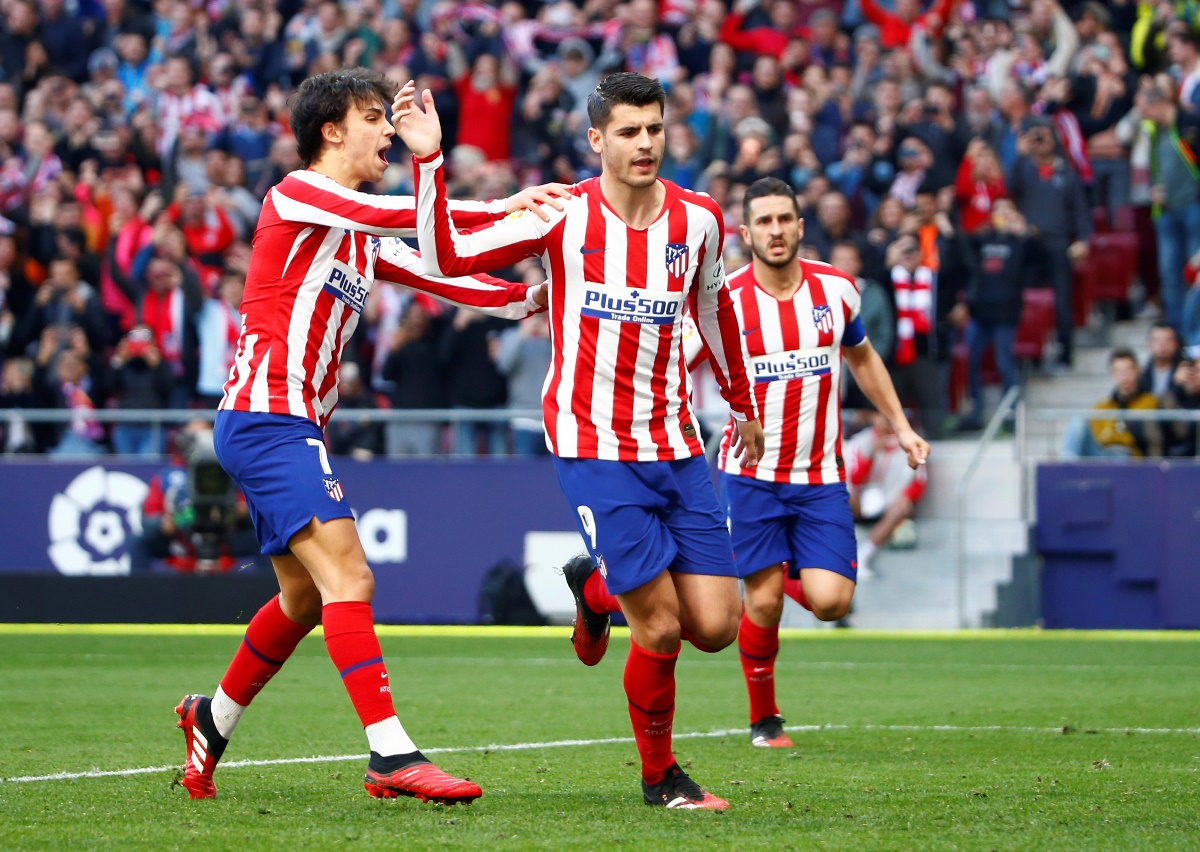 Soccer Football - La Liga Santander - Atletico Madrid v Sevilla - Wanda Metropolitano, Madrid, Spain - March 7, 2020  Atletico Madrid's Alvaro Morata celebrates scoring their first goal from the penalty spot with Joao Felix   REUTERS