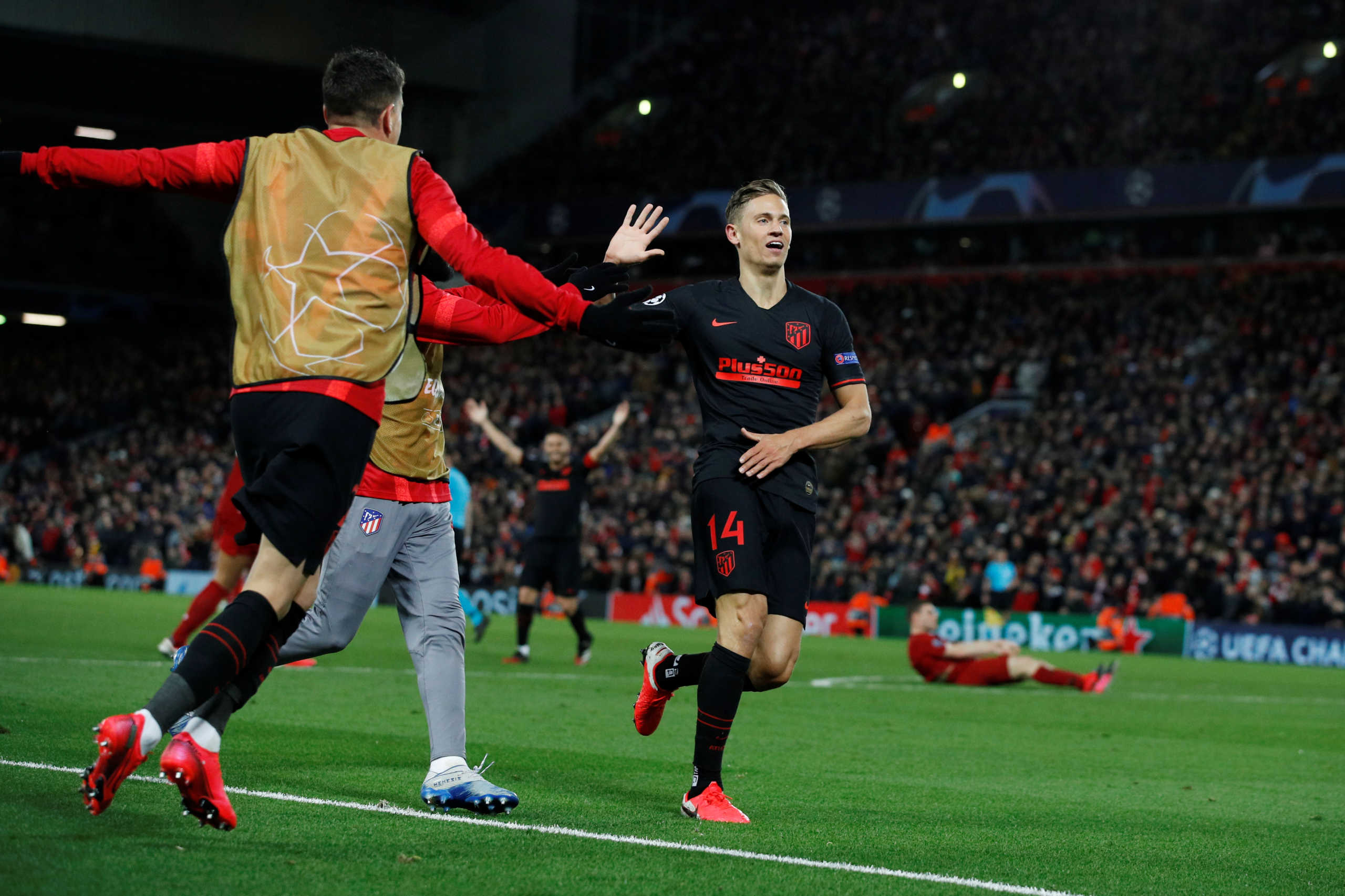 Soccer Football - Champions League - Round of 16 Second Leg - Liverpool v Atletico Madrid - Anfield, Liverpool, Britain - March 11, 2020  Atletico Madrid's Marcos Llorente celebrates scoring their second goal with teammates   REUTERS