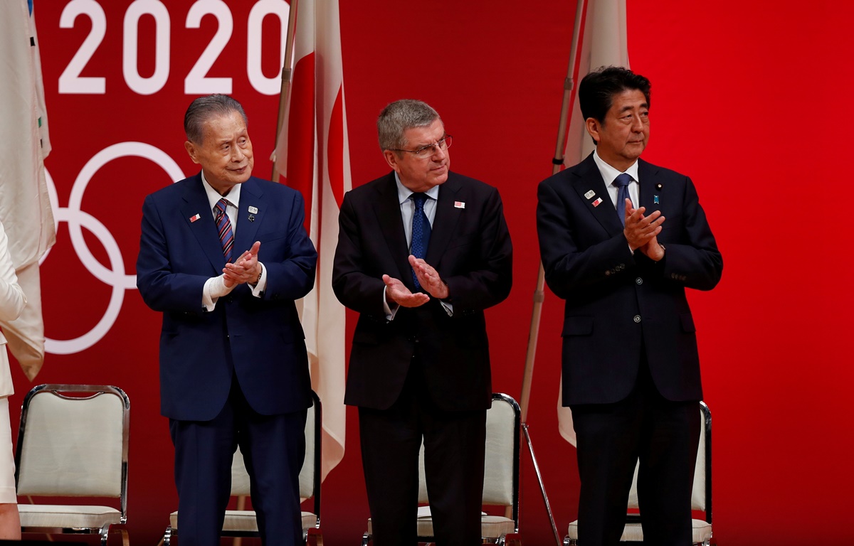FILE PHOTO : Tokyo Governor Yuriko Koike, Tokyo 2020 President Yoshiro Mori, International Olympic Committee (IOC) President Thomas Bach and Japan's Prime Minister Shinzo Abe attend the 'One Year to Go' ceremony celebrating one year out from the start of the summer games at Tokyo International Forum in Tokyo, Japan July 24, 2019.  REUTERS