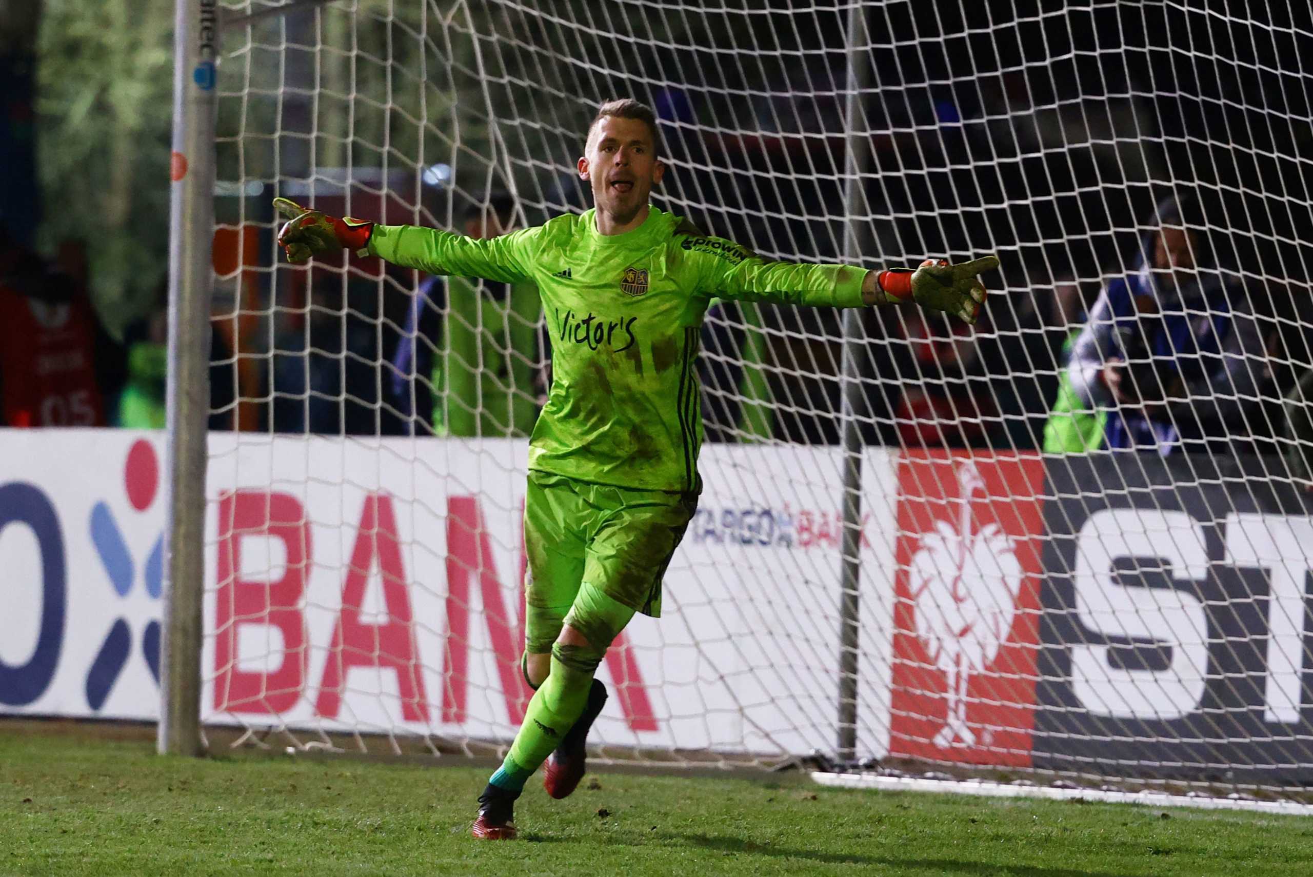 Soccer Football - DFB Cup - FC Saarbrucken v Fortuna Dusseldorf - Hermann-Neuberger-Stadion,  Saarbrucken, Germany - March 3, 2020   FC Saarbrucken's Daniel Batz celebrates winning the penalty shootout   REUTERS