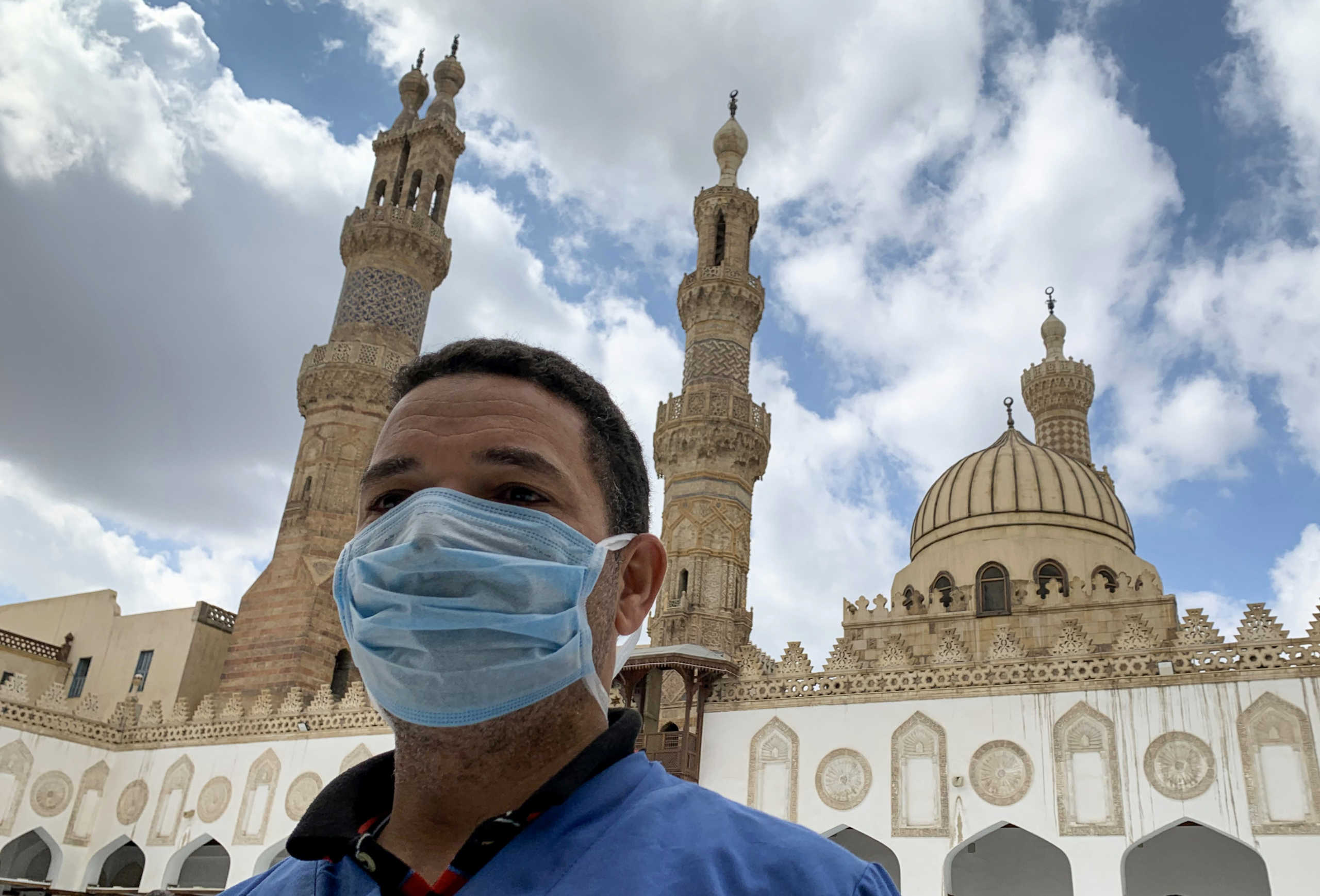A man wearing a protective face mask is seen after attending the Friday prayers inside Al-Azhar mosque in the old Islamic area of Cairo while Egypt ramps up its efforts to slow down the spread of the coronavirus disease (COVID-19) in Cairo, Egypt March 20, 2020. REUTERS