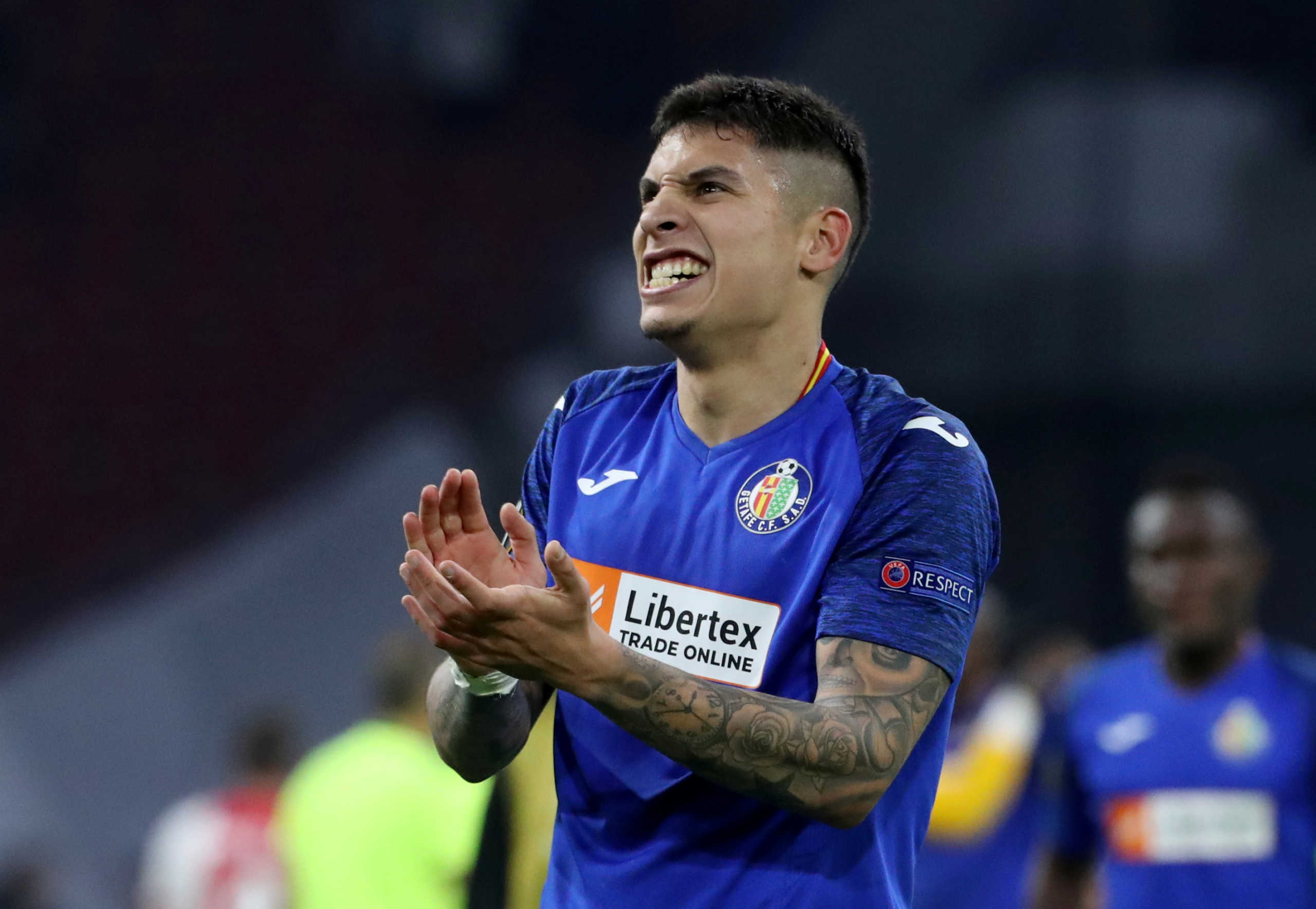 Soccer Football - Europa League - Round of 32 Second Leg - Ajax Amsterdam v Getafe - Johan Cruijff Arena, Amsterdam, Netherlands - February 27, 2020  Getafe's Mathias Olivera applauds fans after the match            REUTERS